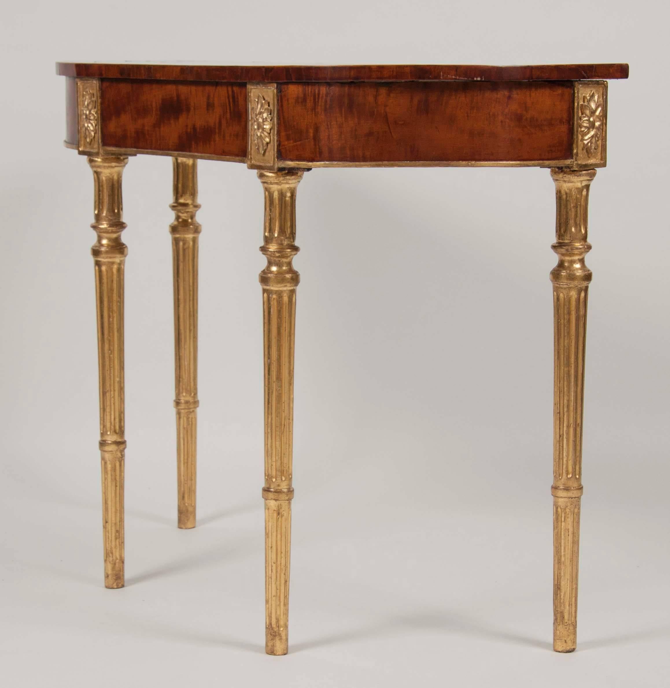 English Pair of Matched George III Mahogany and Satinwood Parcel-Gilt Console Tables