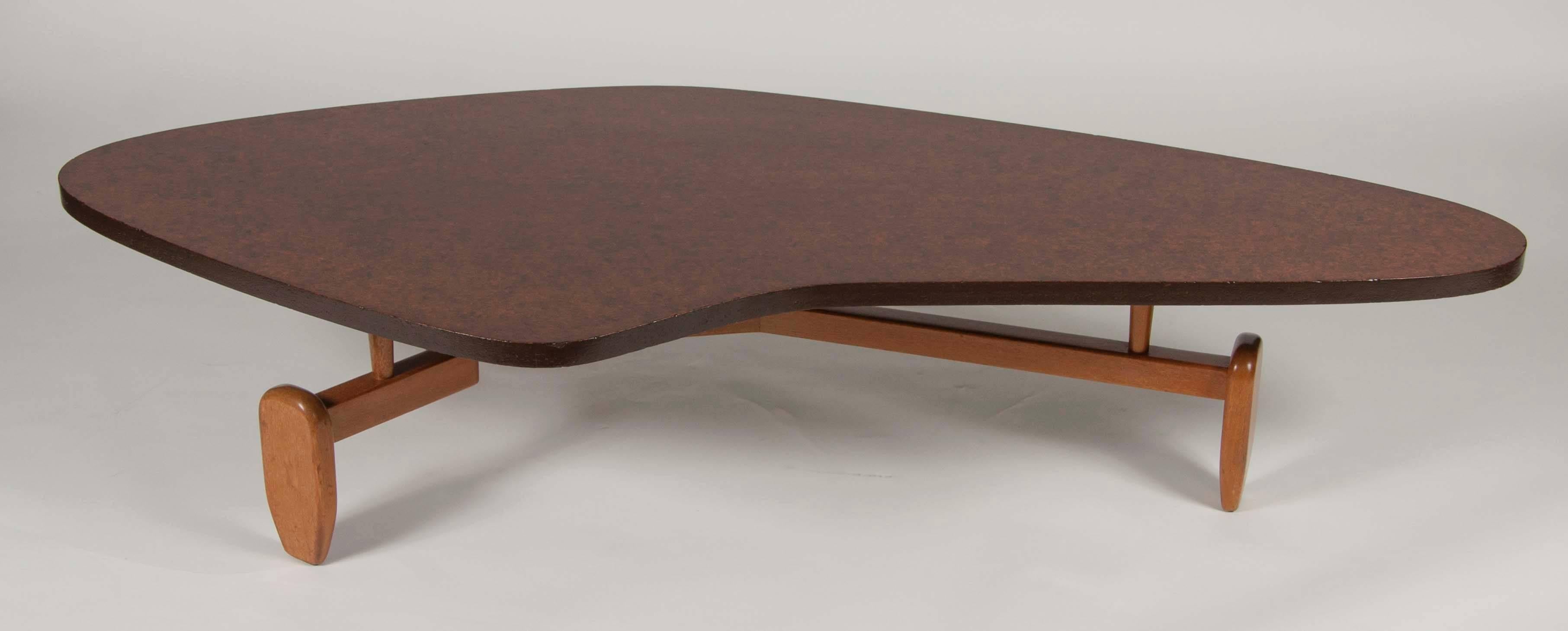 A beautiful mahogany coffee table by John Keal for Brown Saltman with 