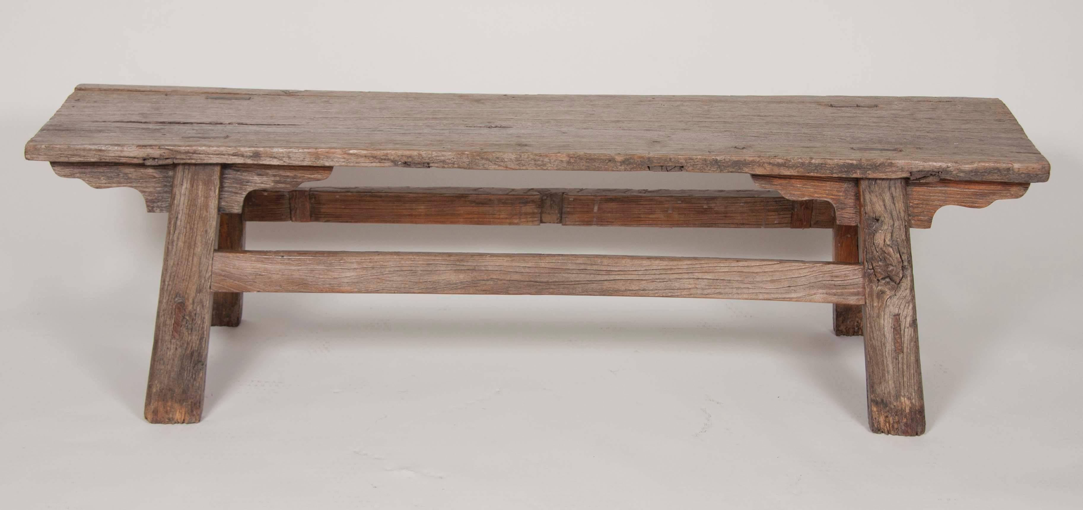 A pair of French, rustic and weathered hardwood benches. May be sold separately.