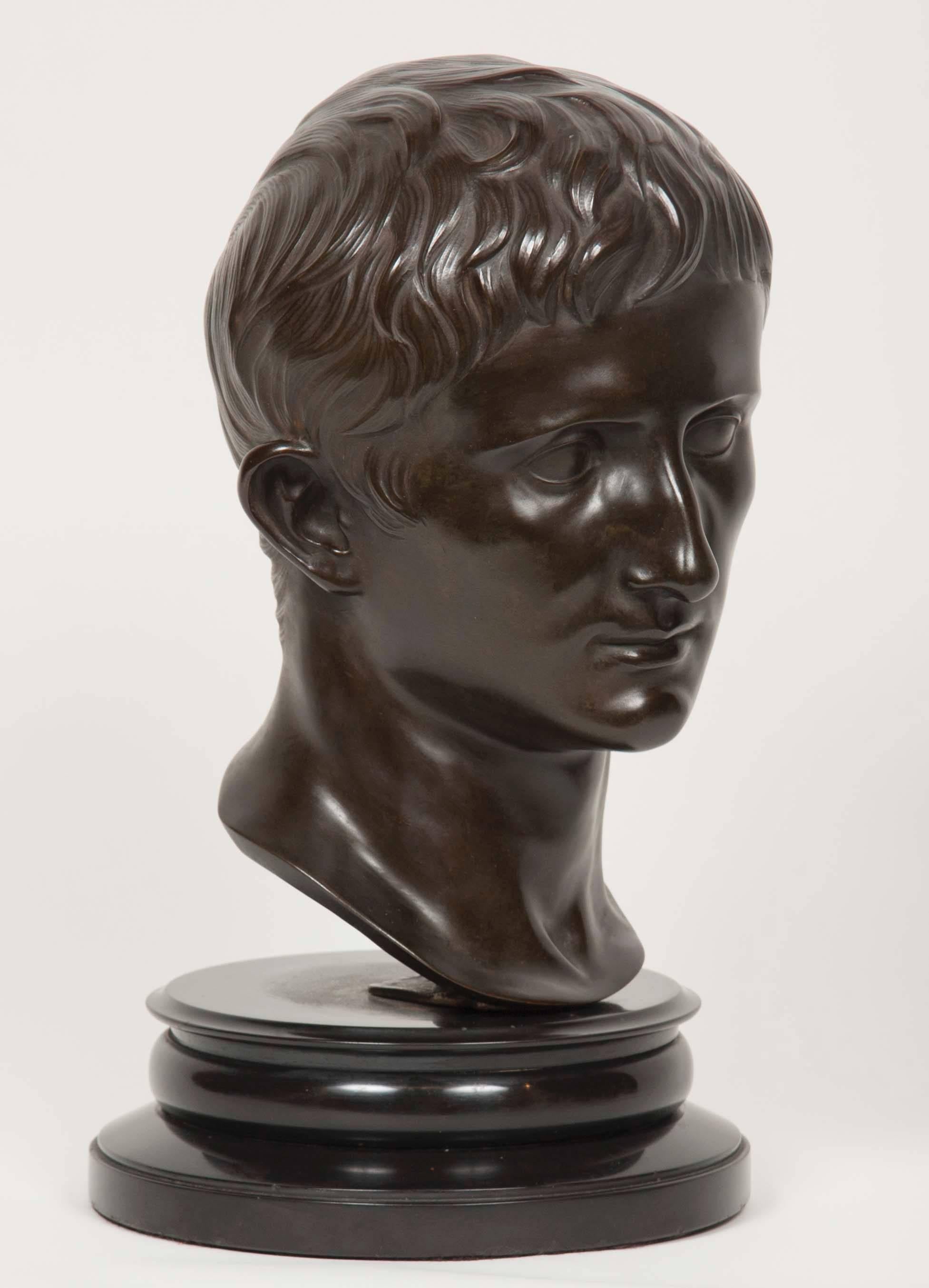 A fine grand tour cast bronze bust of Roman emperor Augustus; after the first century AD marble bust. Excellent patina.