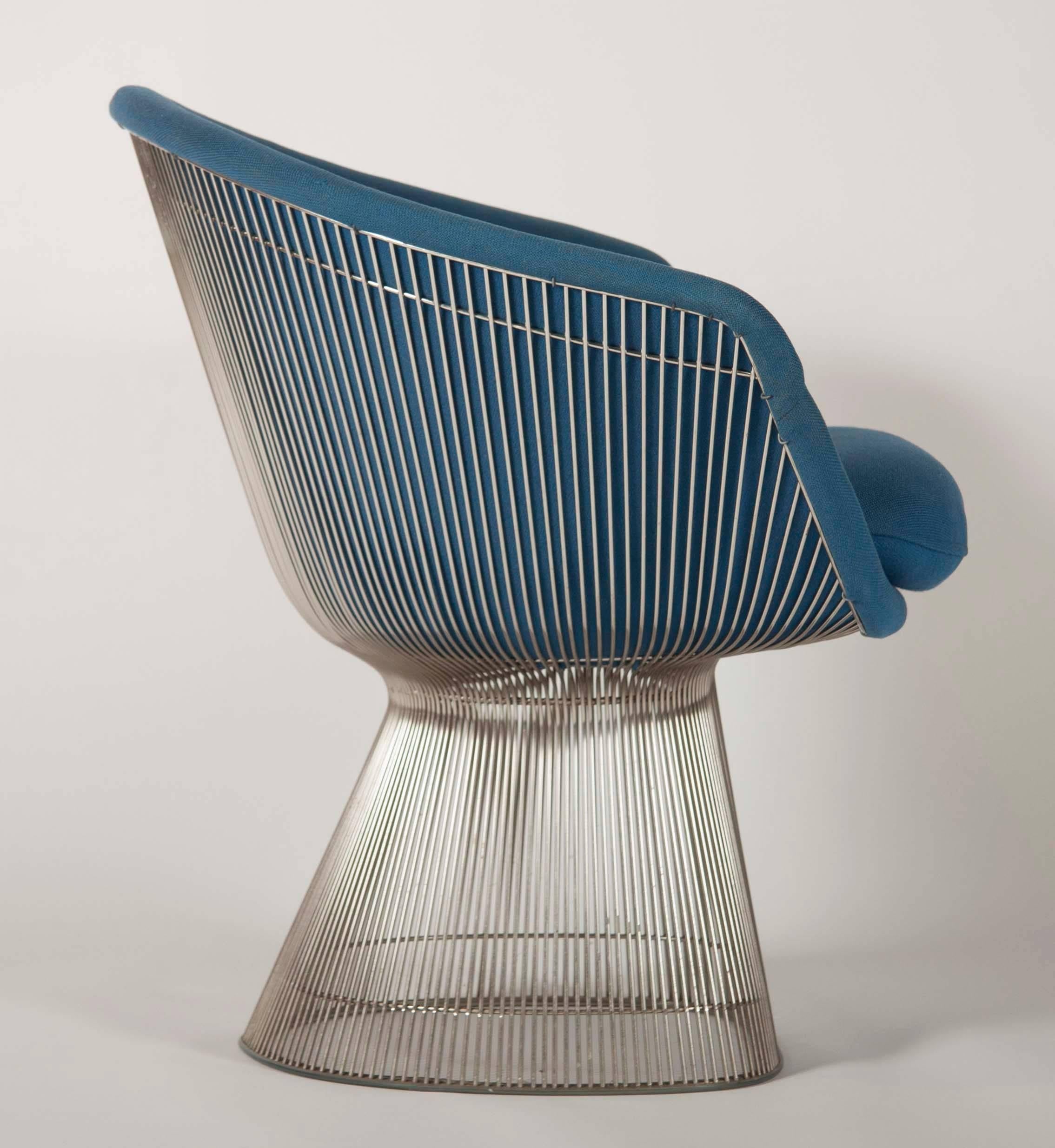 A pair of blue wool upholstered Warren Platner lounge chairs. Chairs are executed in nickel-plated steel. Platner label under cushion of both chairs marked December 10, 1980.