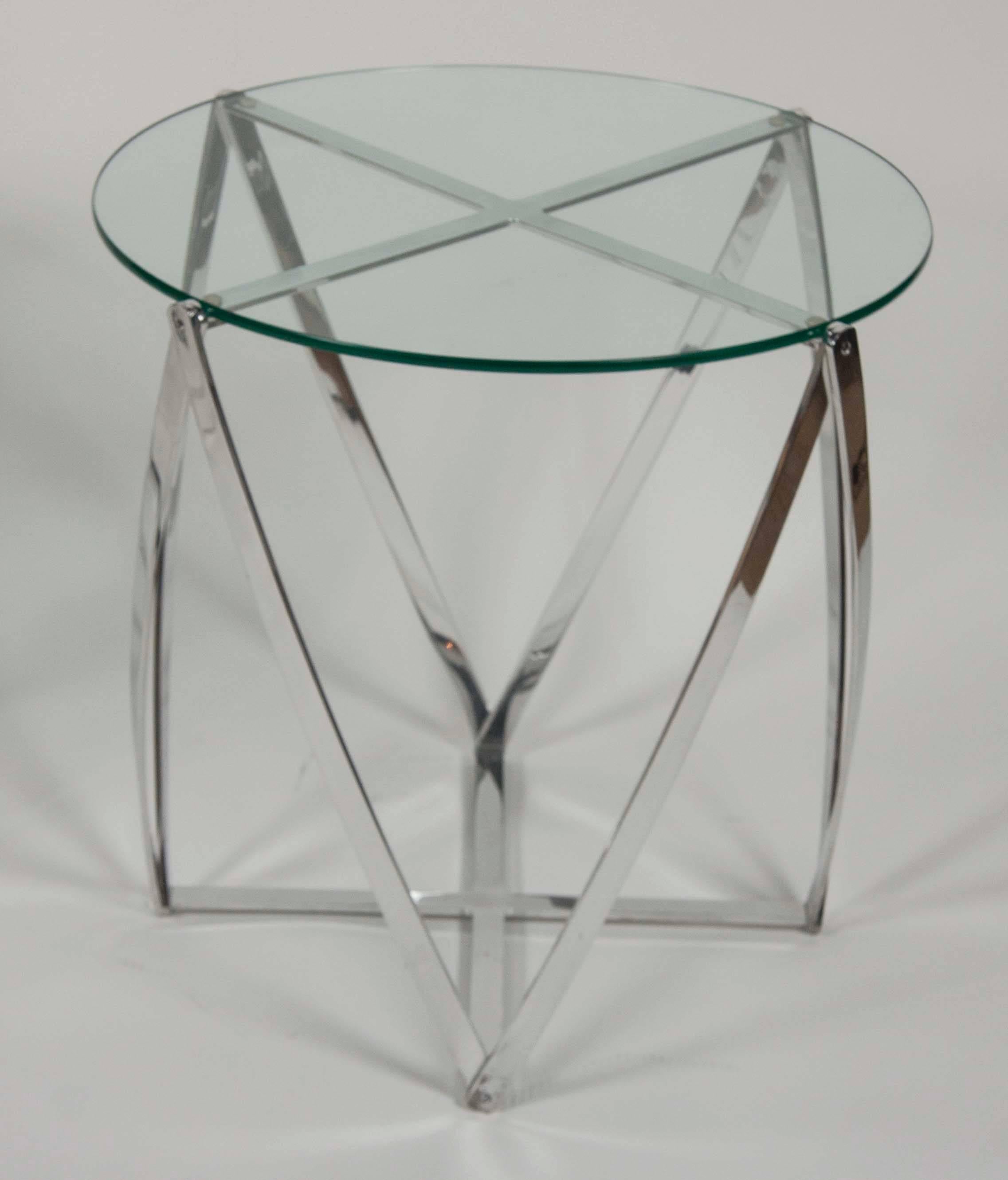 A John Vesey aluminum frame round glass top side table. 