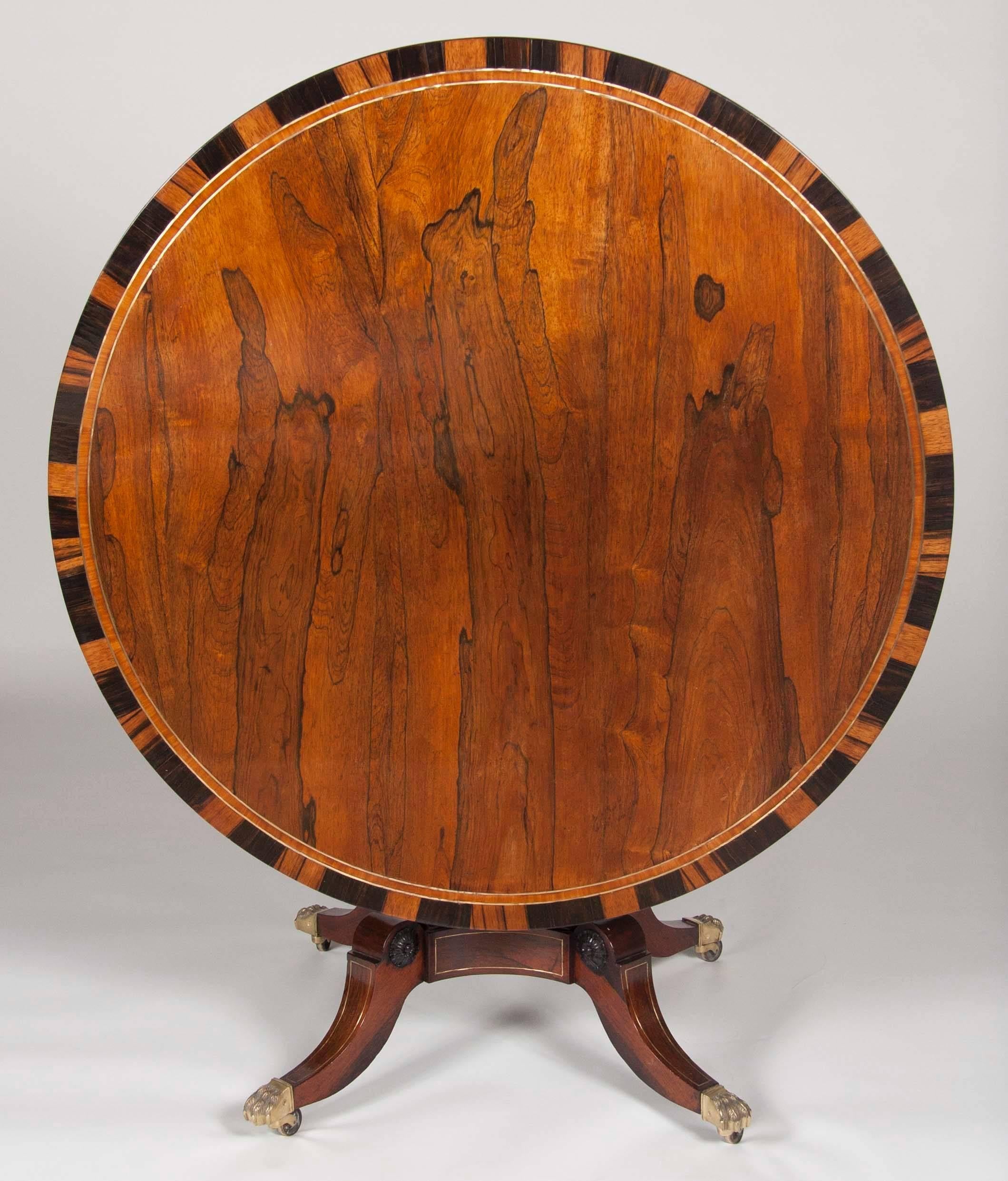 Regency A Rosewood, Burwood and Calamander Centre Table In The Manner of George Oakley