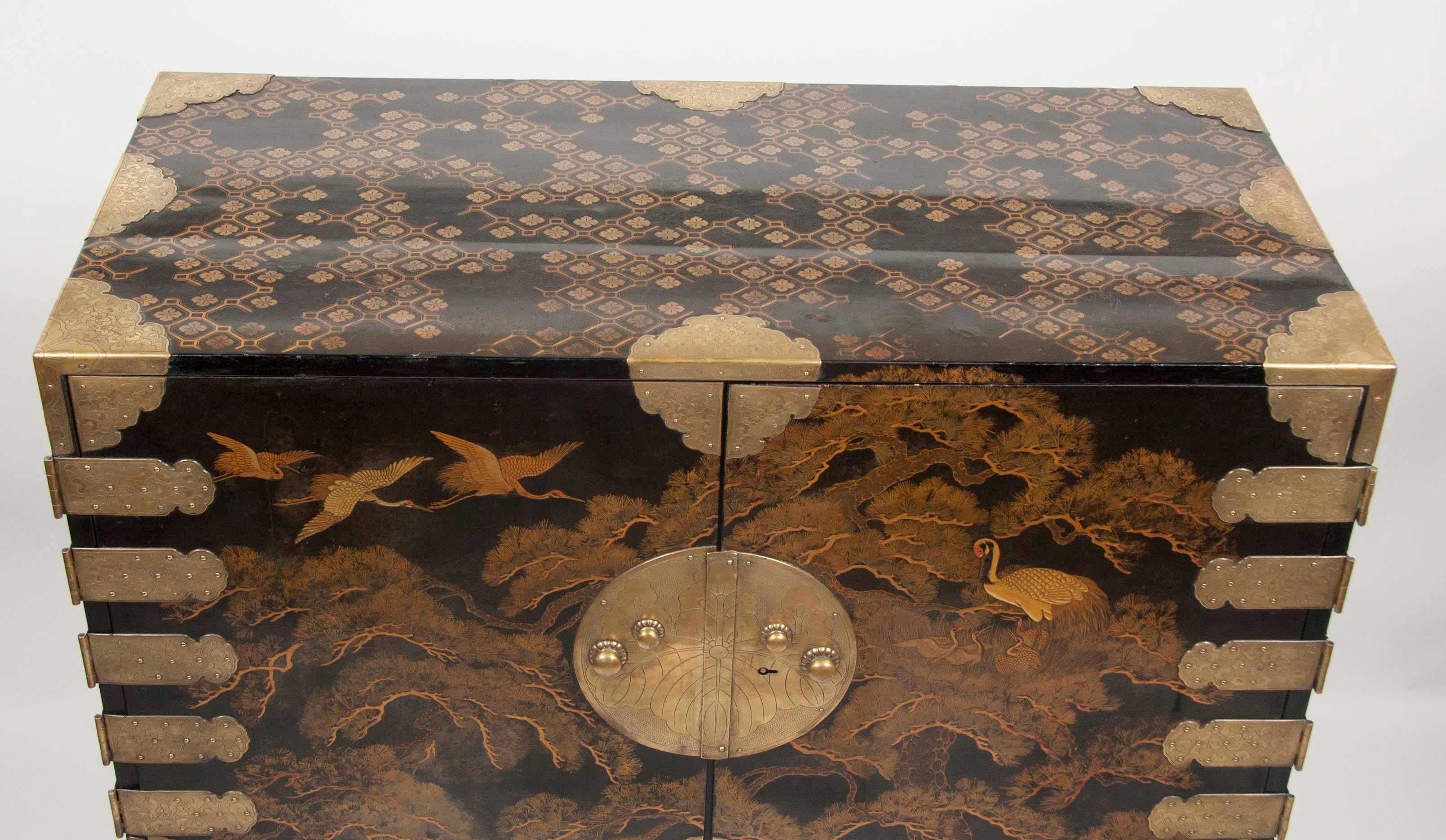 Striking Japanese Gilt and Black Lacquer Cabinet on Later Stand In Good Condition In Stamford, CT