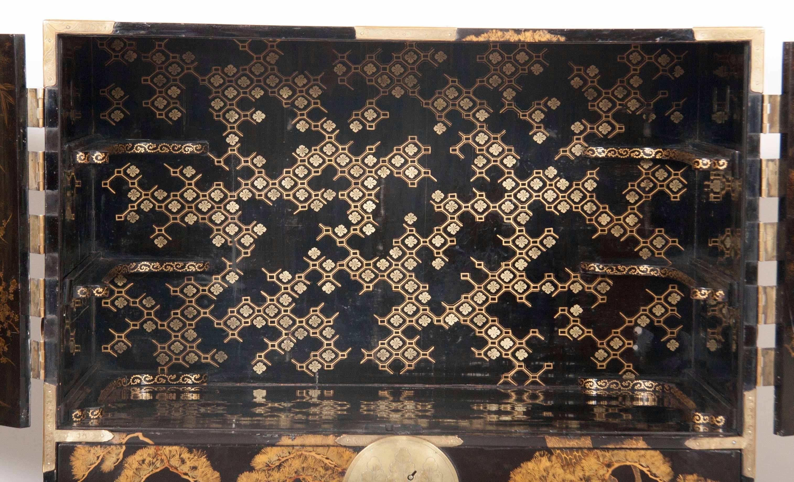 Striking Japanese Gilt and Black Lacquer Cabinet on Later Stand 1