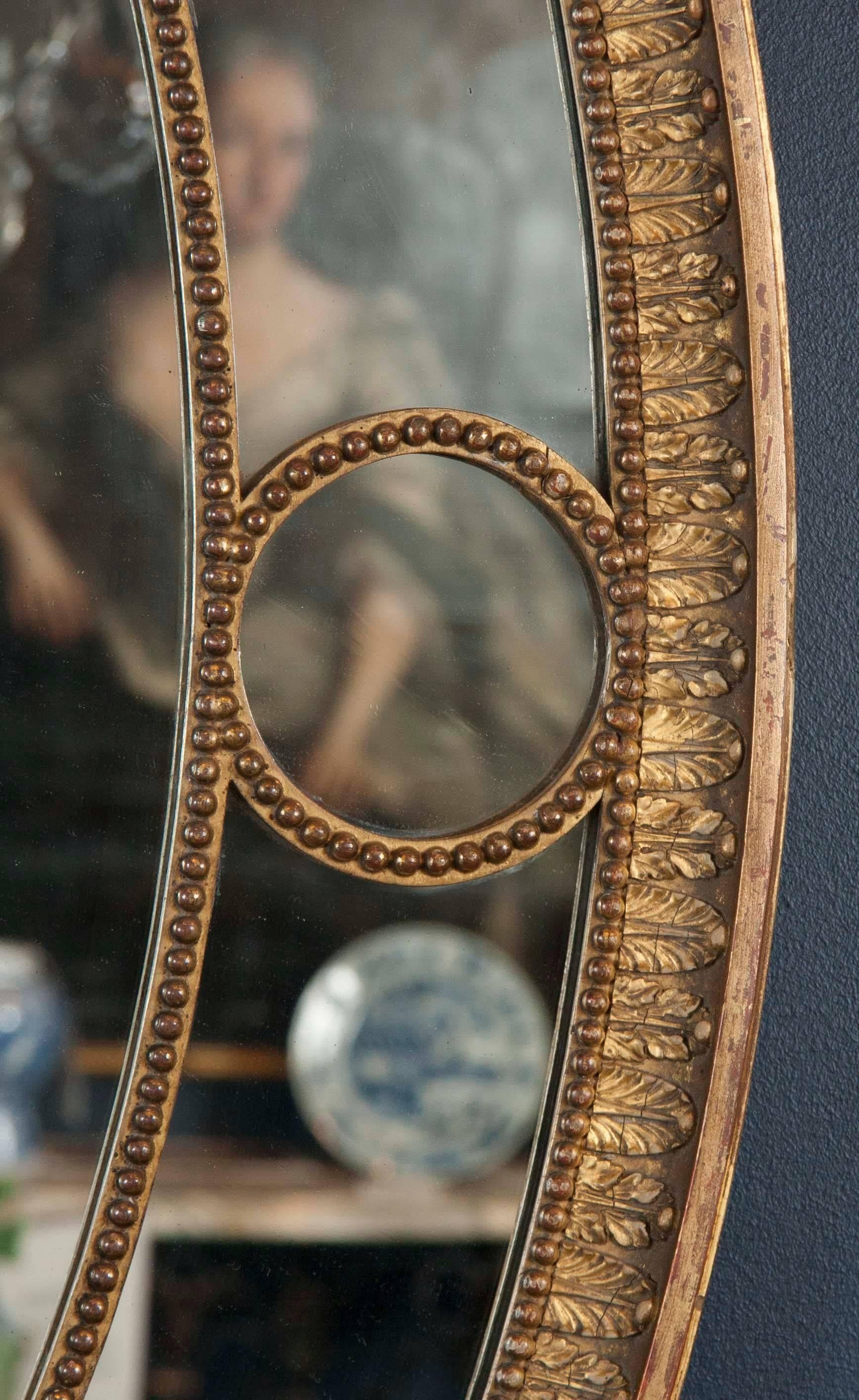 19th Century Pair of English Oval Giltwood Mirrors