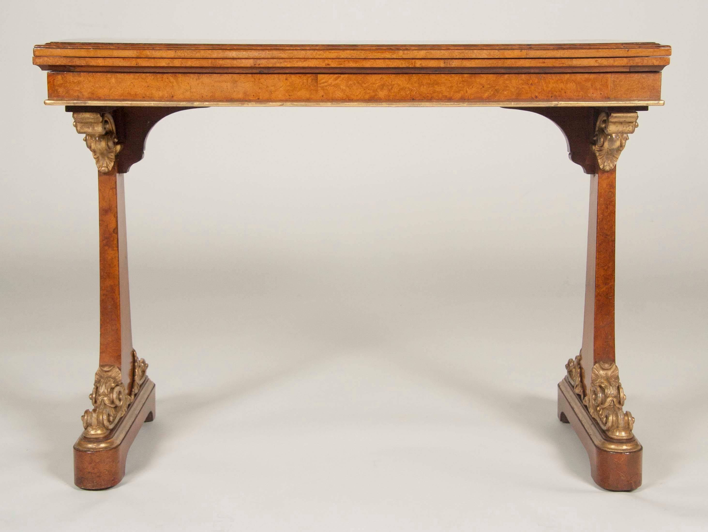 A late Regency burl wood and giltwood games table produced by T.G Seddon (cabinet maker for the queen).