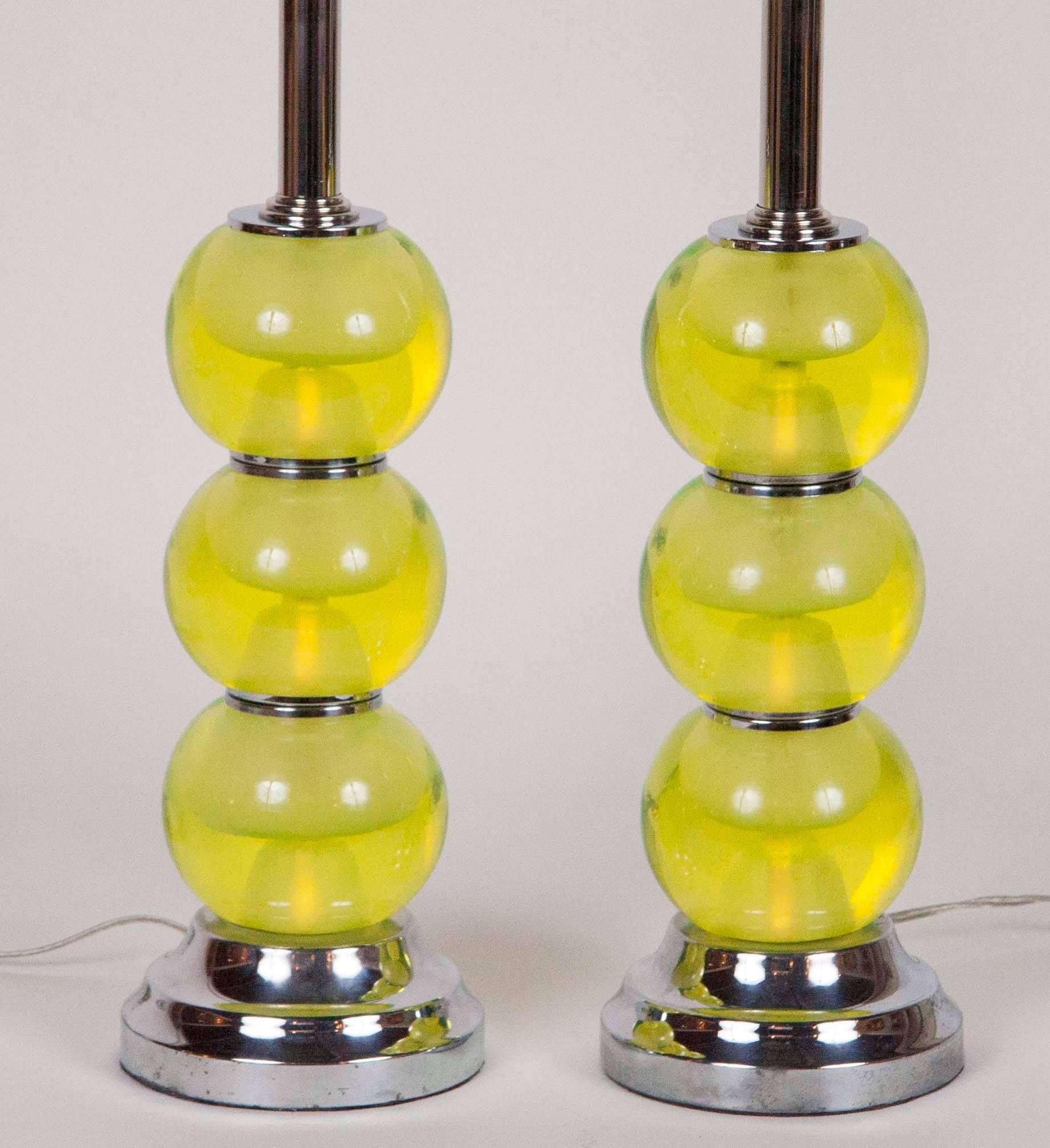A pair of vintage Mid-Century Murano glass lamps with chrome mounts.
