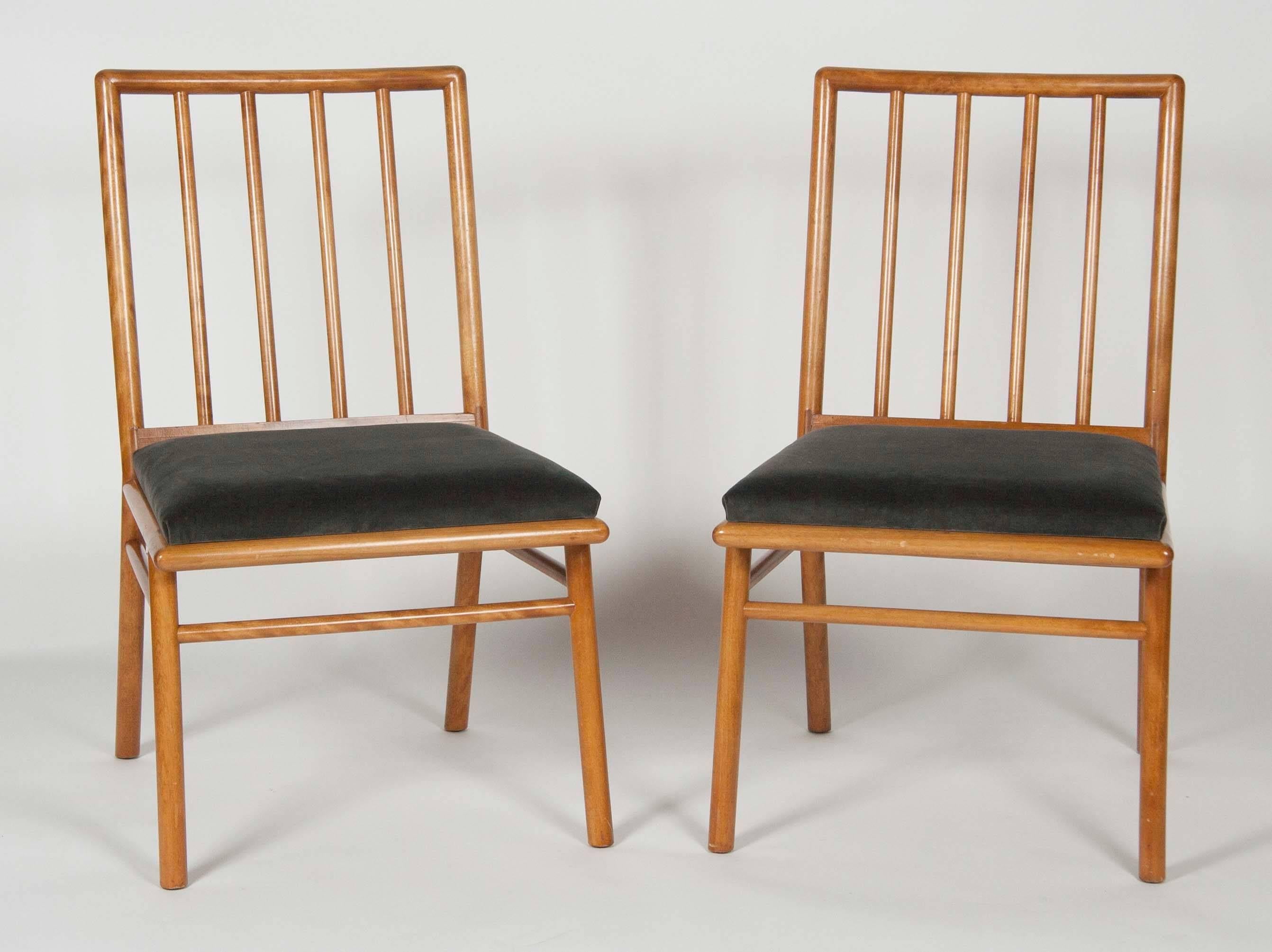 A set of four Mid-Century side chairs by T.H. Robsjohn-Gibbings.