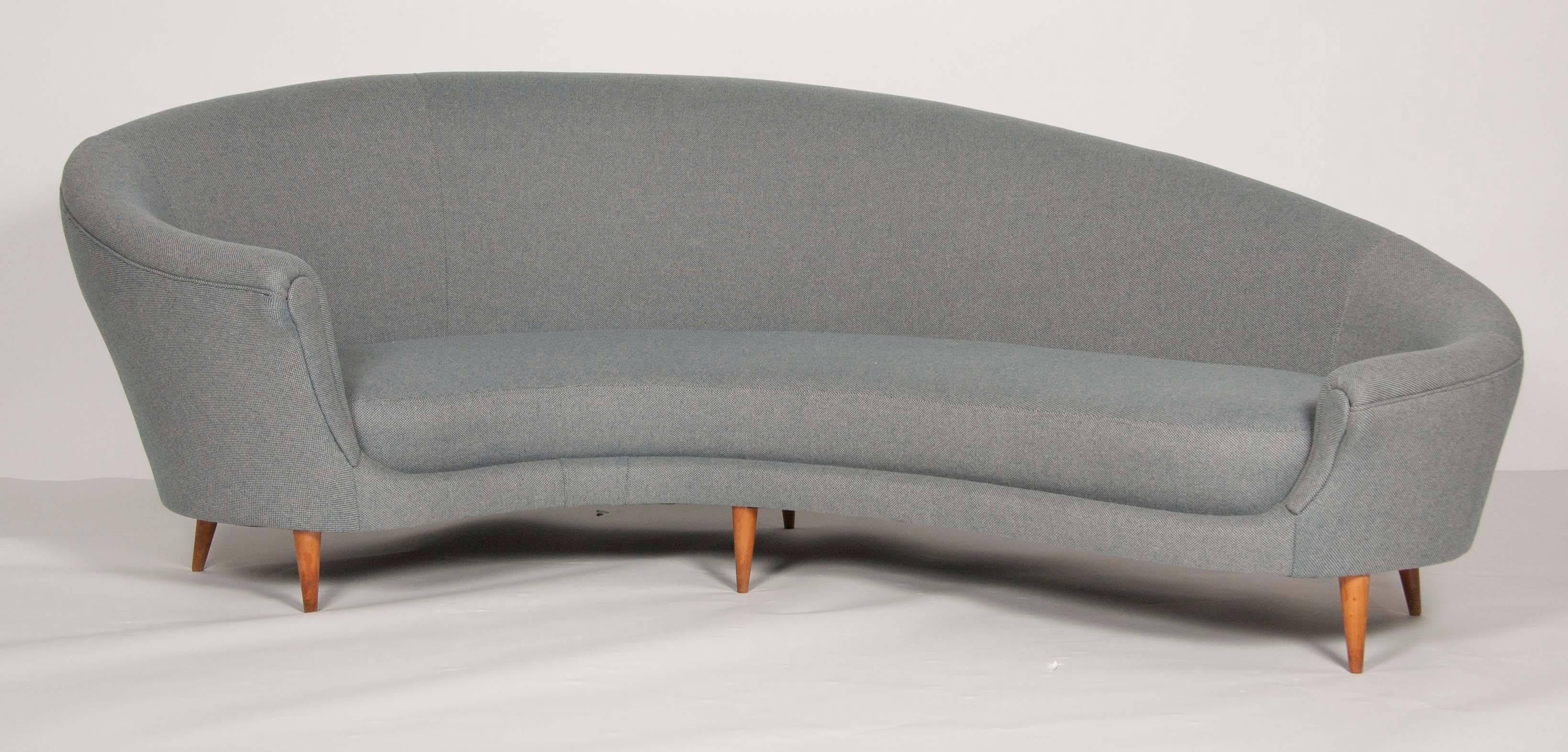 An Italian free form sofa in the manner of Federico Munari. Very finely upholstered in felted wool by Rogers and Goffigon.