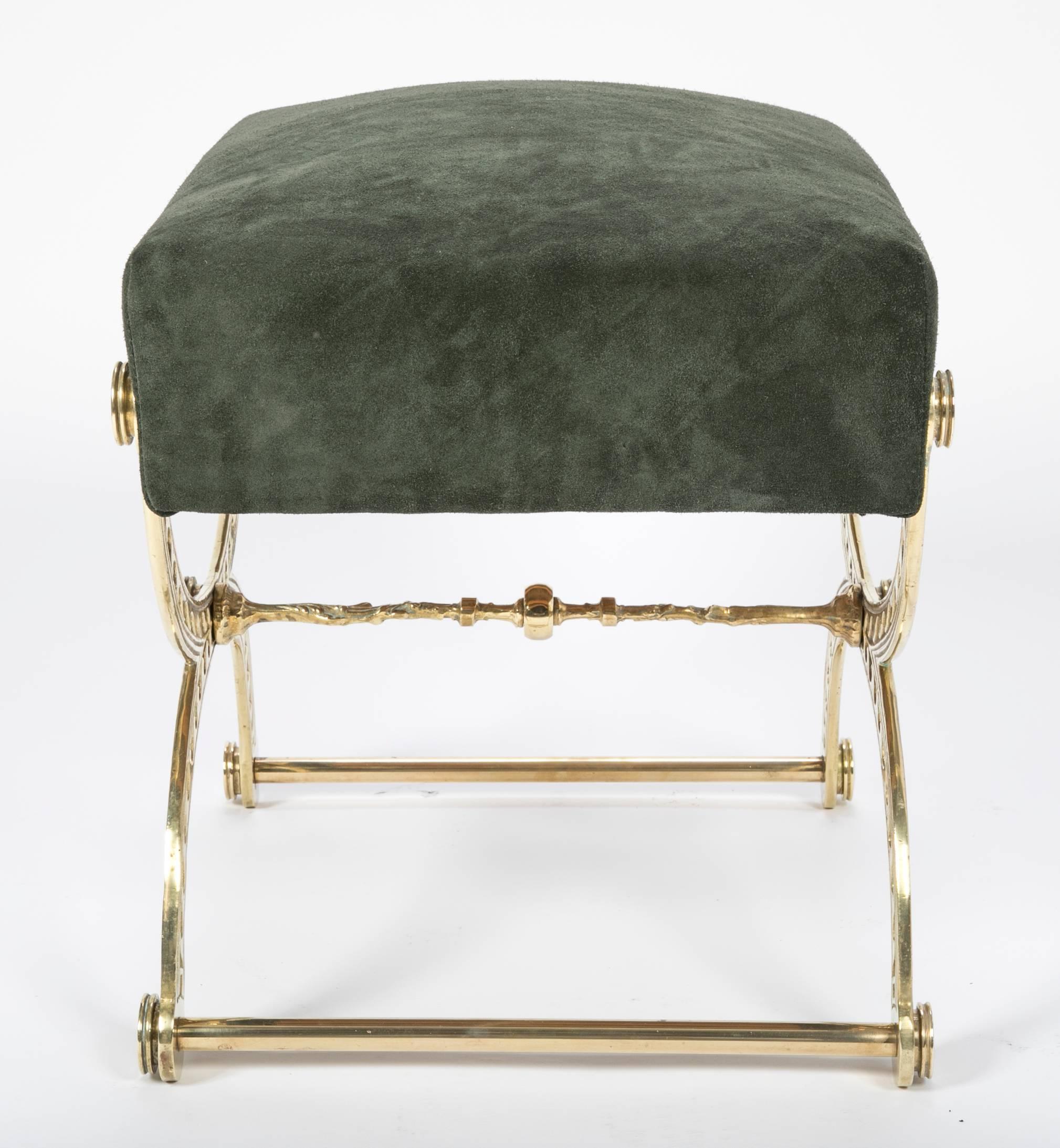 A Brass and Suede Cerule form Stool with Vitruvian wave decoration. Newly upholstered in Green suede. 