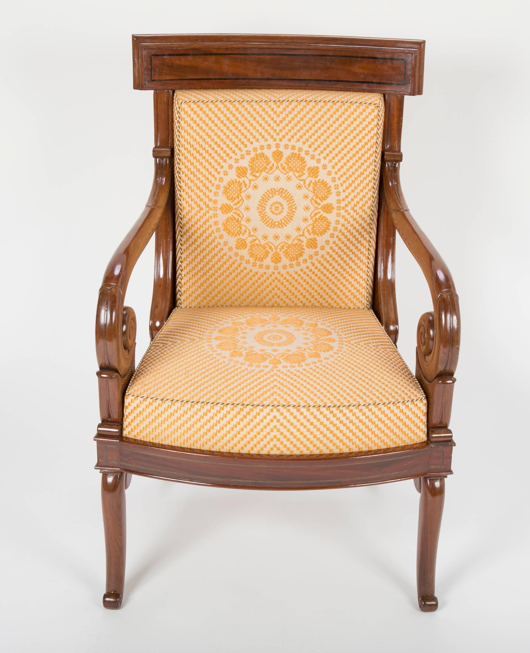 All of the chairs are stamped JJ Werner on the underside of their front rail.  The chairs are carved out of Mahogany.  The stringing details on the back rest and apron are actually brass inlay that has been ebonized.   The chairs are all upholstered