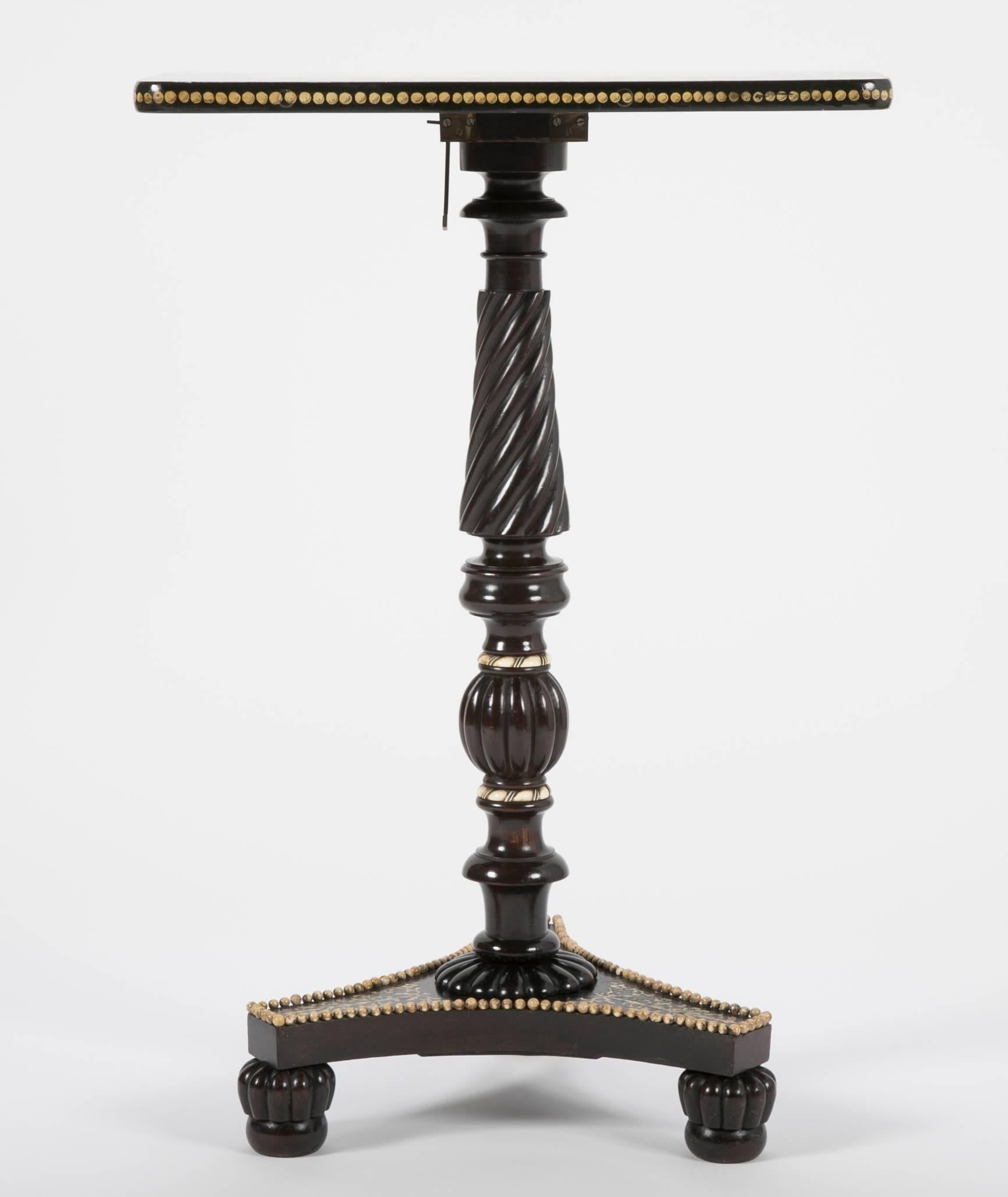 Ebonized wood and bone penwork side table; previously tilt-top, England, circa 1810.