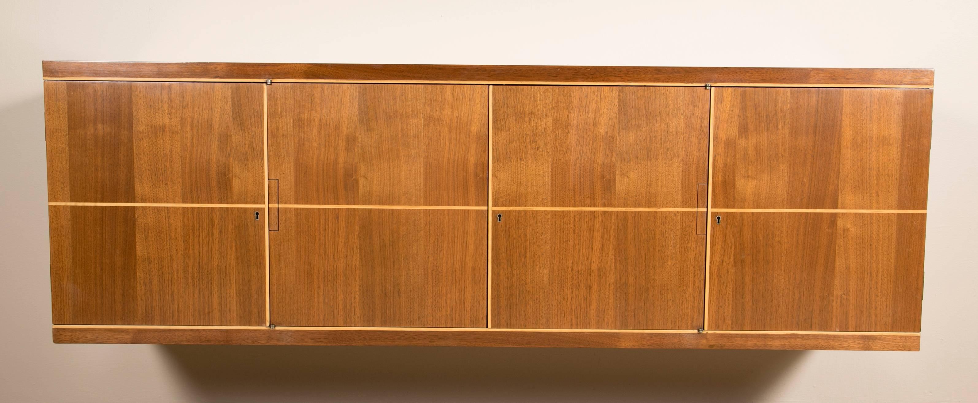 Mid-Century Modern Tommi Parzinger Design Four-Section Walnut Credenza