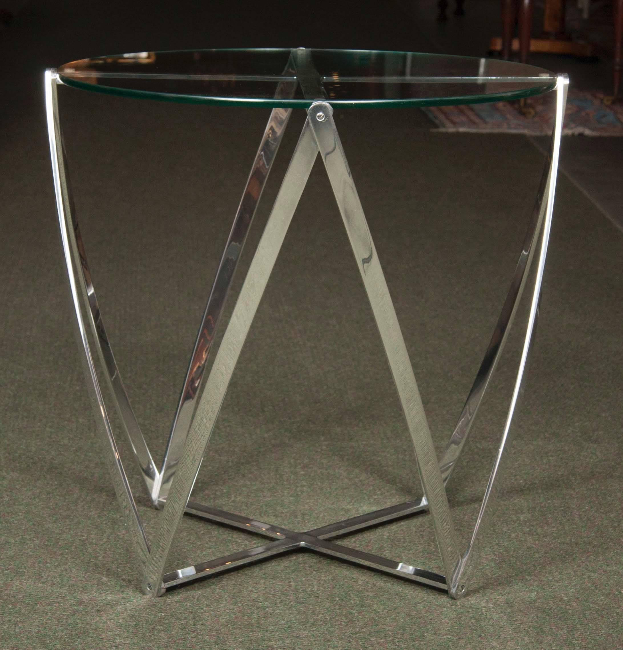 A  aluminum frame, round glass-top side table designed by John Vesey from the third quarter of the 20th century.