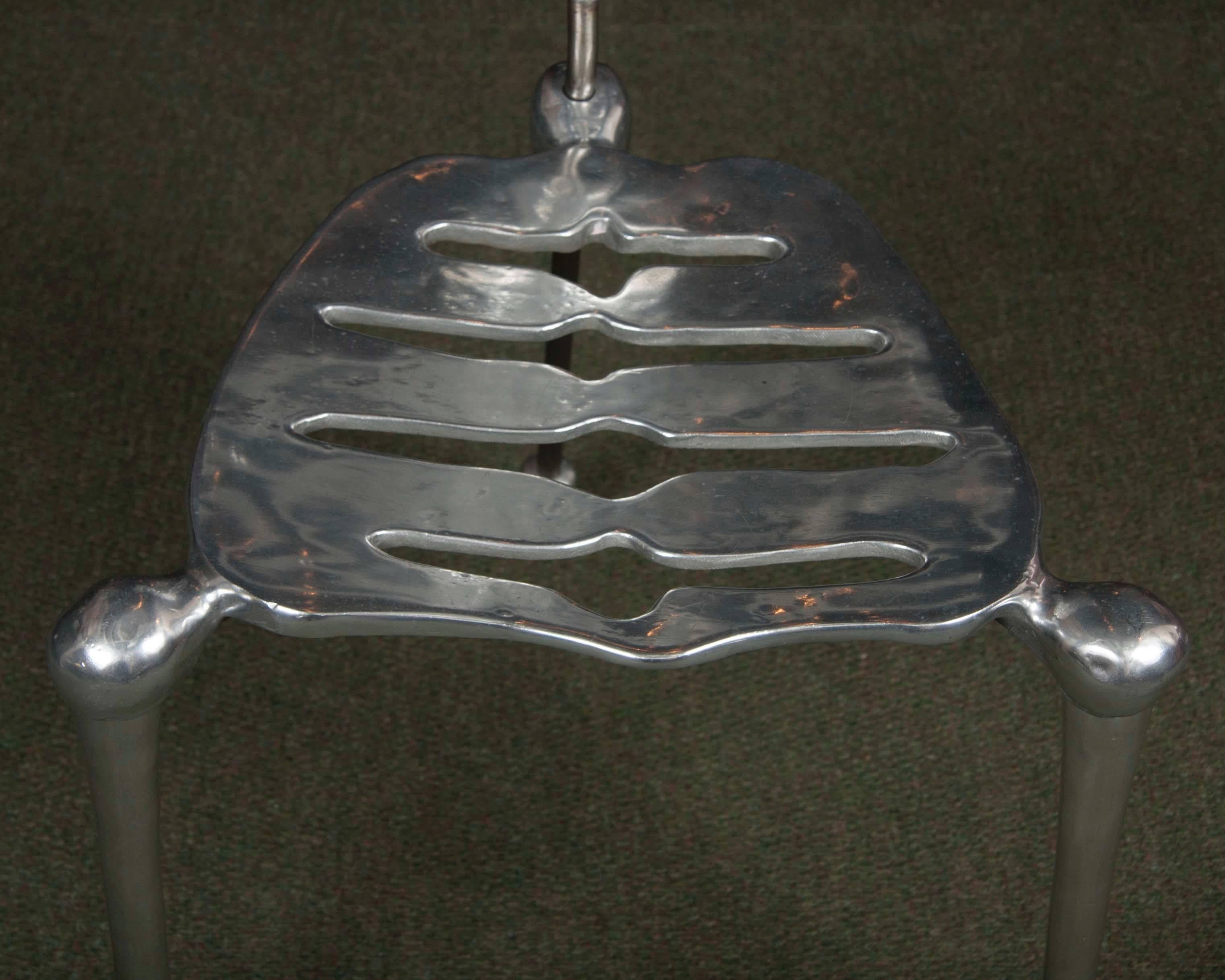 skeleton in chair