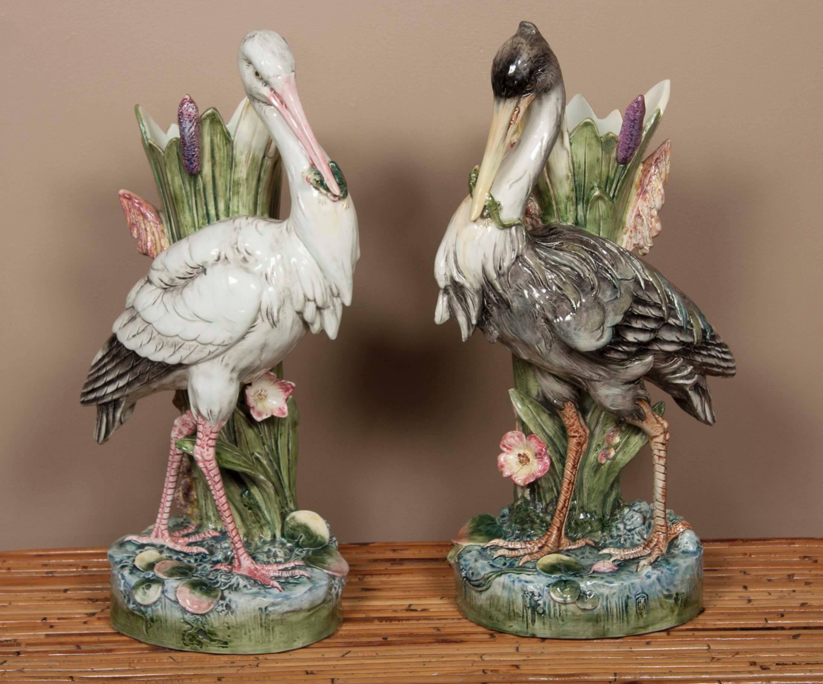 An exceptional pair of 19th Century French majolica male and  female Herons.