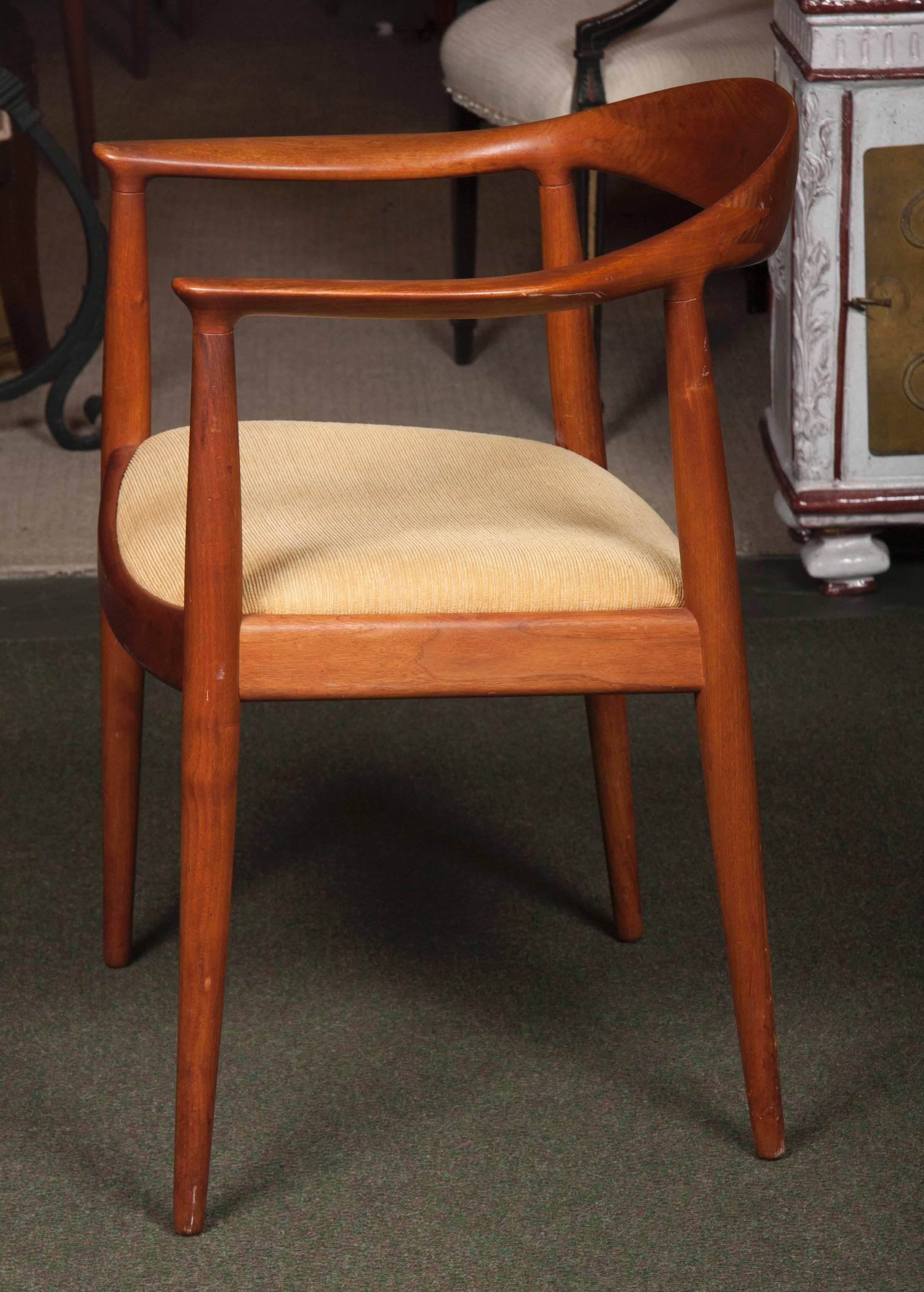 A pair of teak, Hans J. Wegner armchairs. 