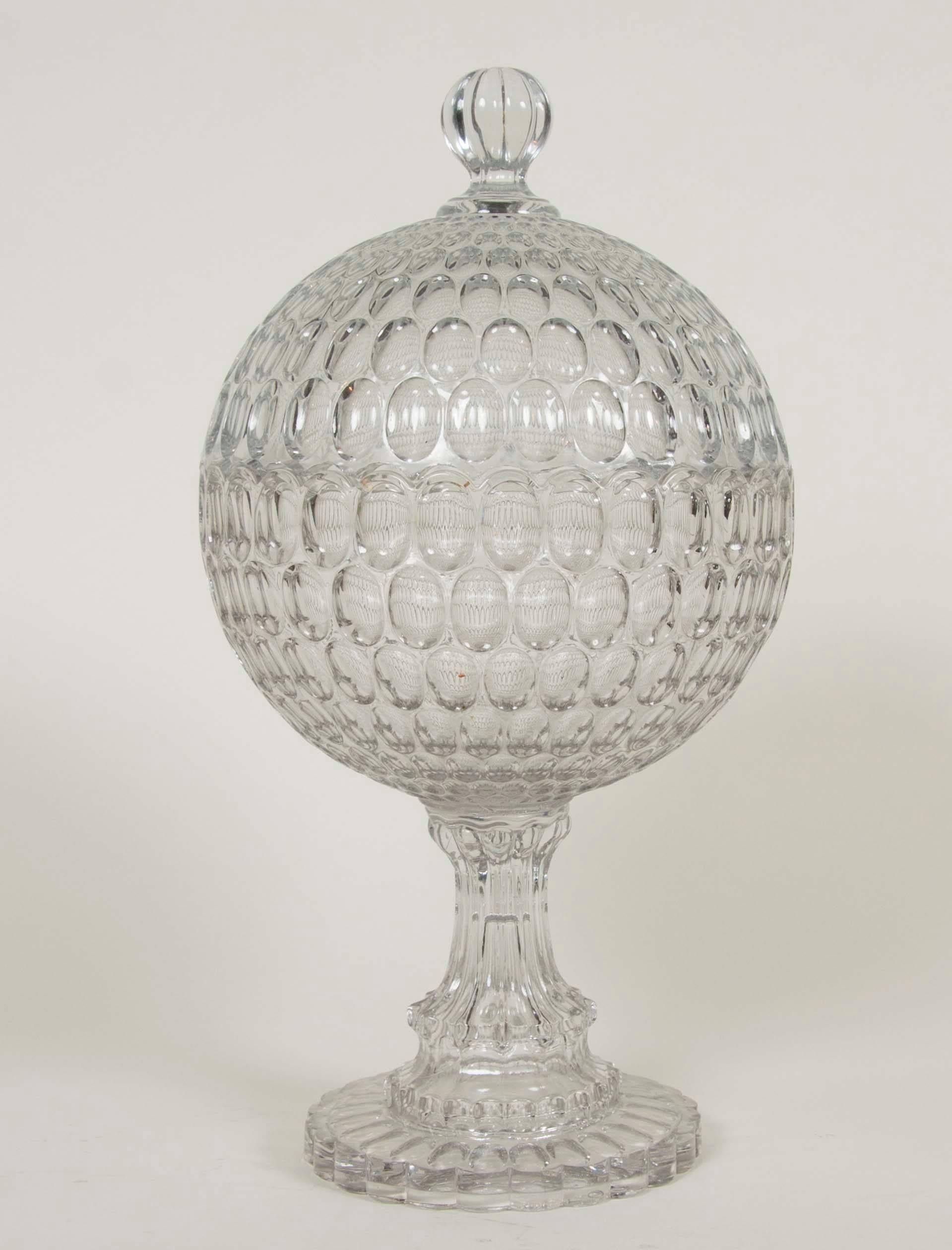 Two early thumbprint/Argus (OMN) covered bowl or compote. Two colorless lead glass bowl featuring a 32 scallop rim above seven rows of thumbprints, raised on a 12 flute double-step hollow standard and a 24 scallop circular foot with a single row of