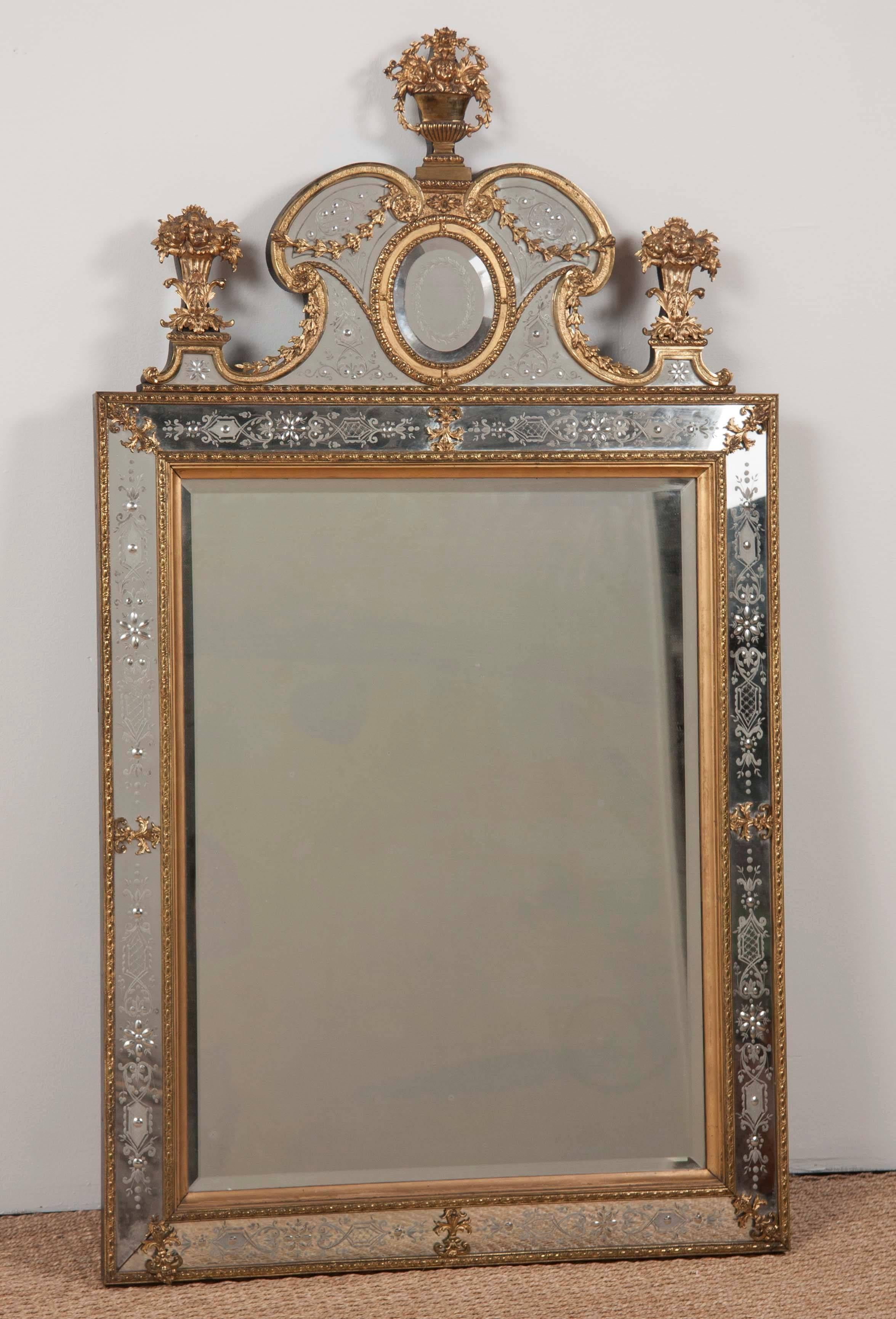 A Matched pair of Swedish ormolu-mounted and Etched glass mirrors after the model by Gustav Precht, second half of the 19th century.
 The rectangular plate within a beveled foliate-decorated surround with foliate clasps, the C-scroll arched