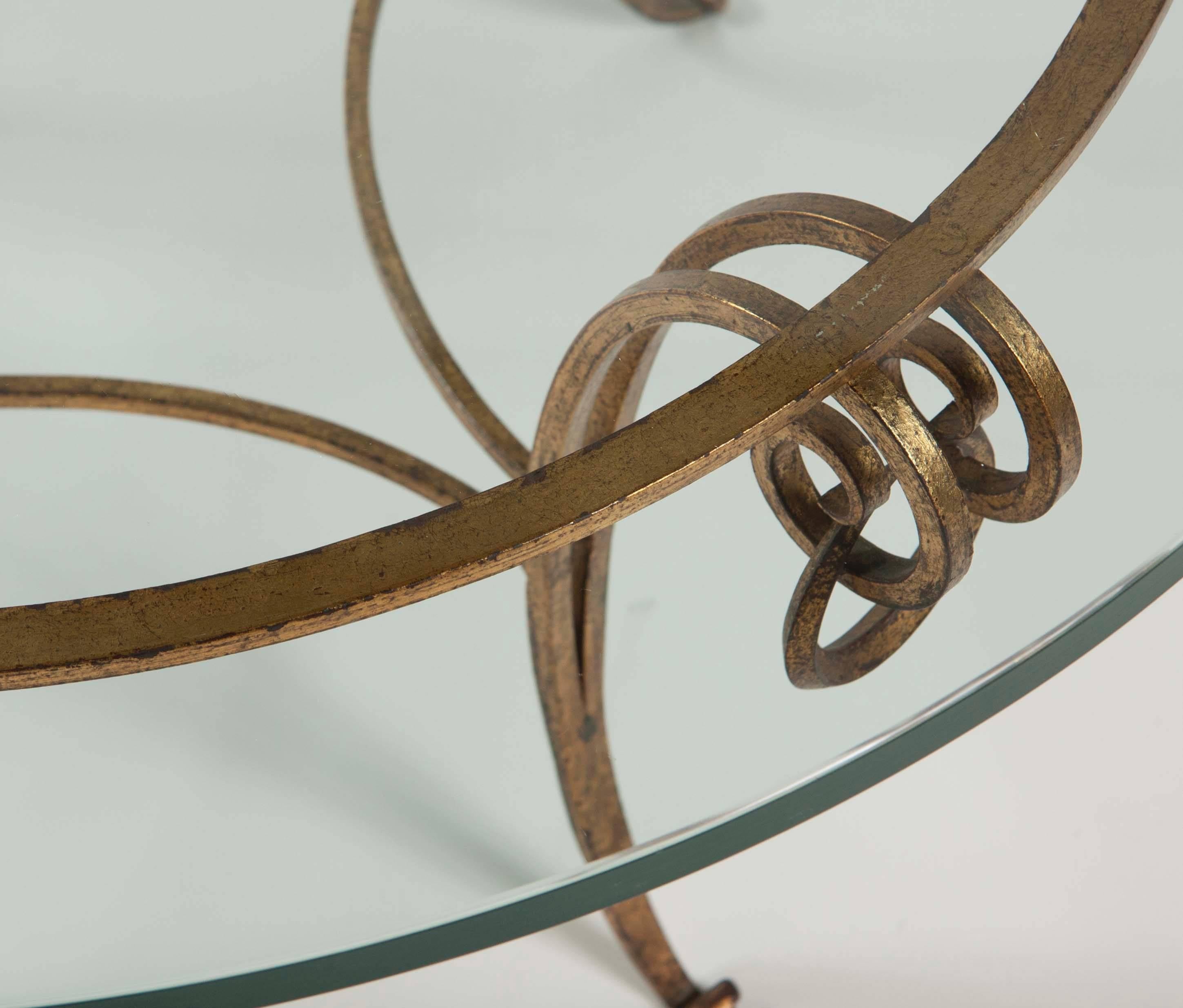 Glass Gilt Iron Coffee Table in the Manner of Rene Drouet For Sale