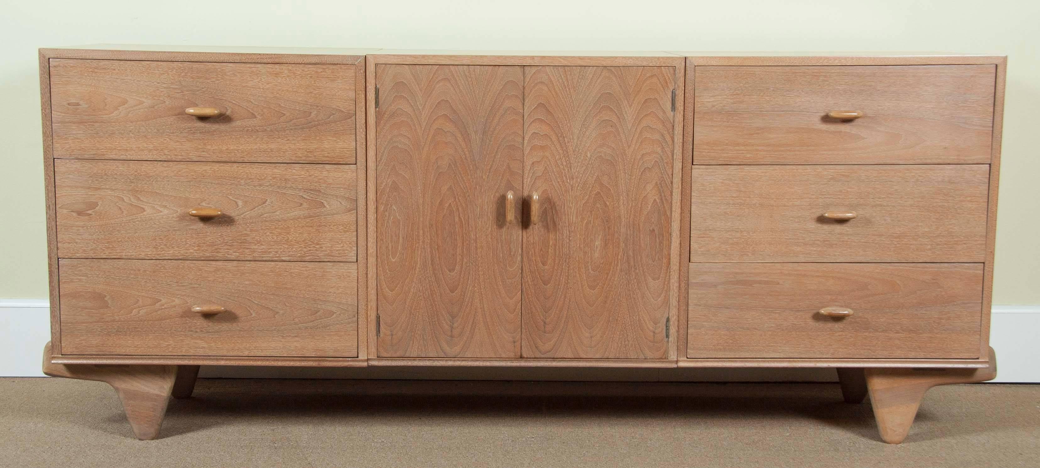 A large chest or sideboard designed by Oscar Stonorov & Willo Von Moltke for
Red Lion Furniture, 1941. This chest was designed for a MoMA exhibition of organic design and had a low production despite being produced by Red Lion. Organic design in