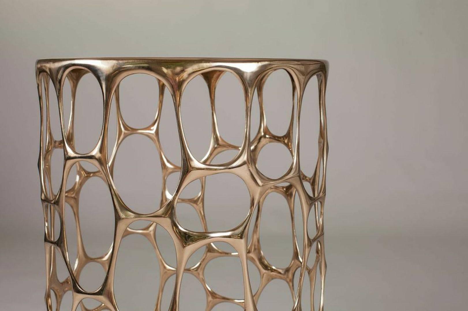 The Homage to Gaudi side table is hand-sculpted and cast in bronze using the time-honored method of lost-wax casting. After casting, each abstract table is painstaking sanded by hand to create a polished bronze finish. Nick Alan King is one of few
