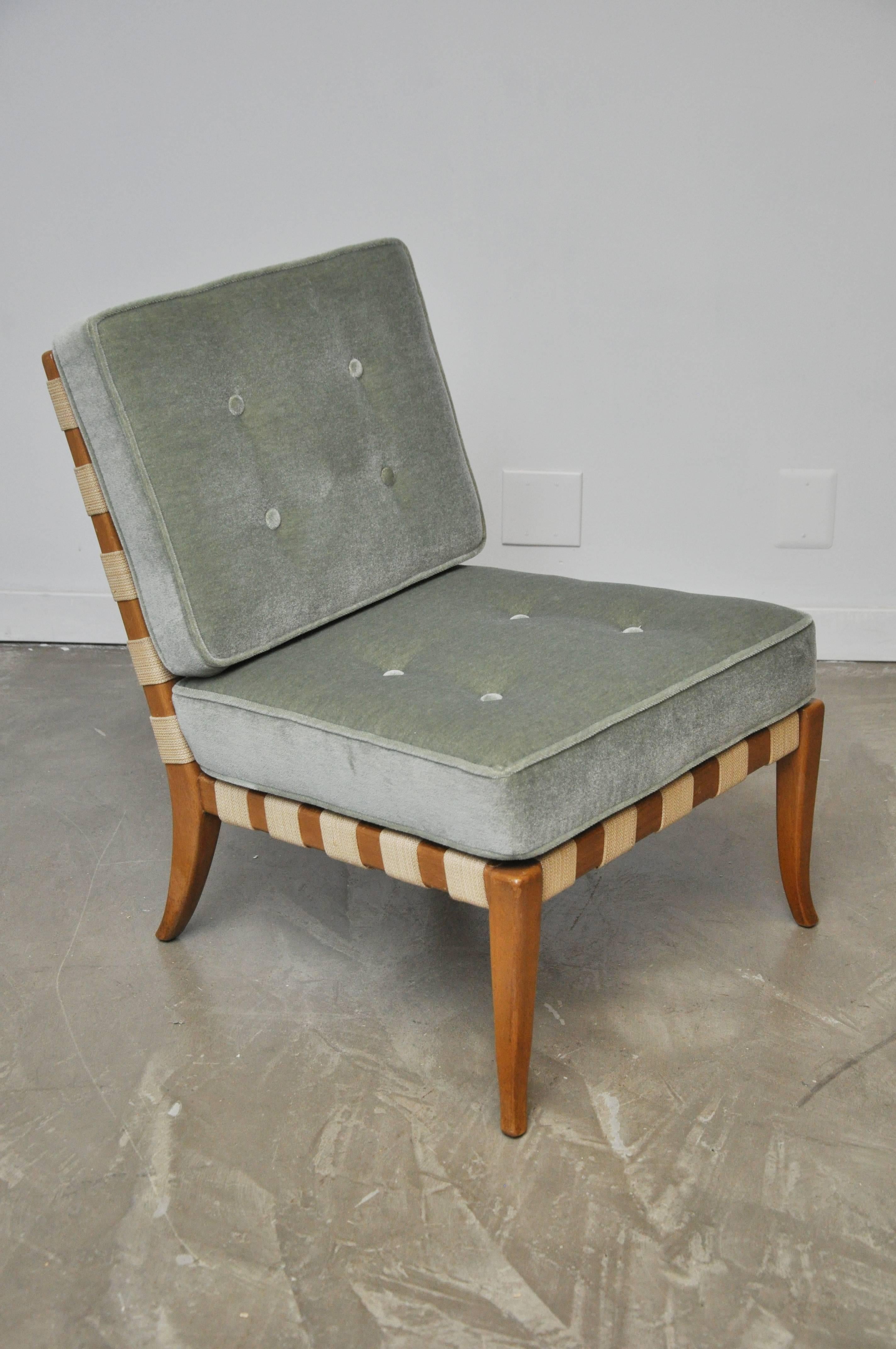 Rare strap slipper chair by T.H. Robsjohn-Gibbings. Original strap webbing over wood frame with new mohair cushions.