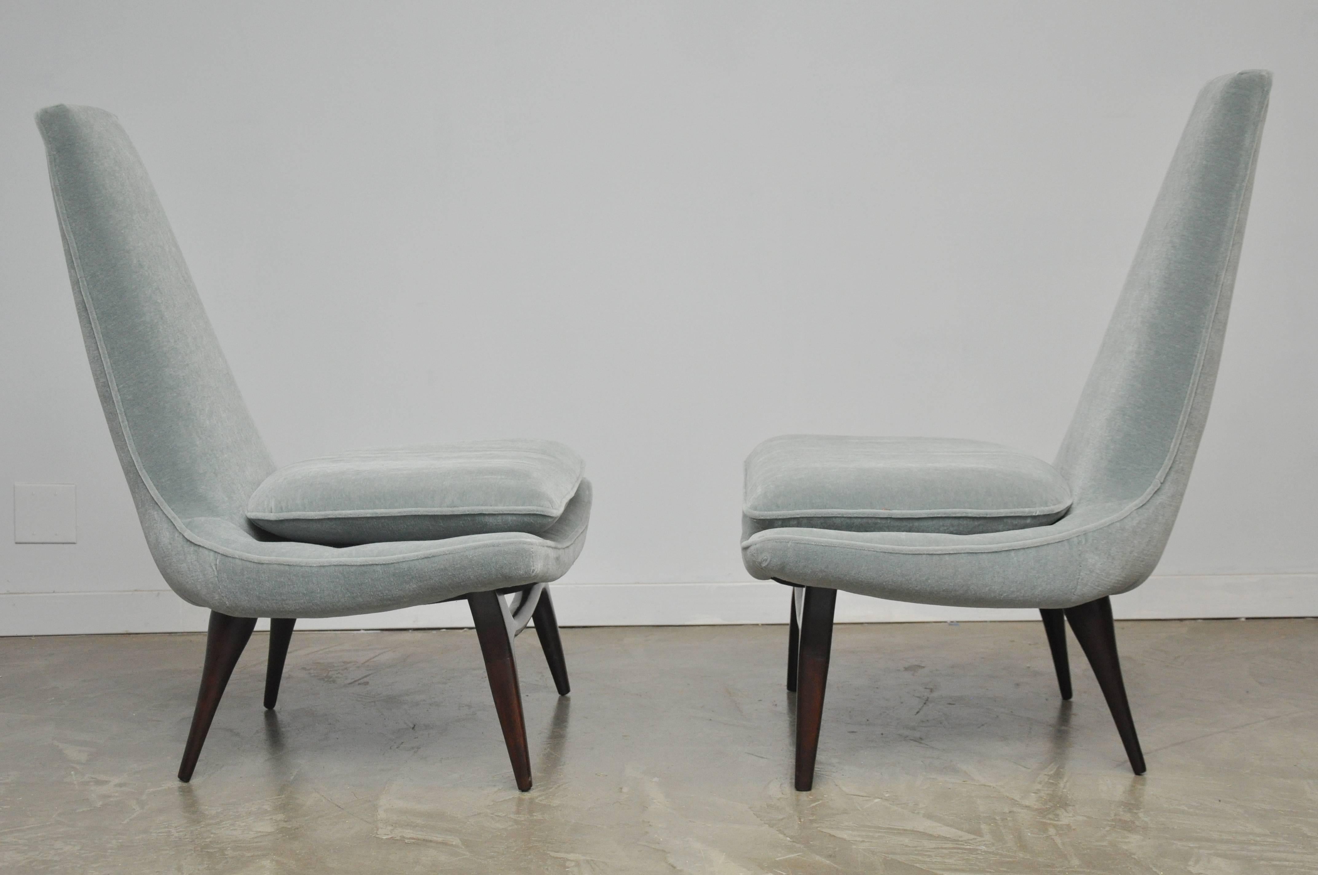 Pair of high back lounge chairs by Karpen of Ca. New mohair upholstery over refinished legs.