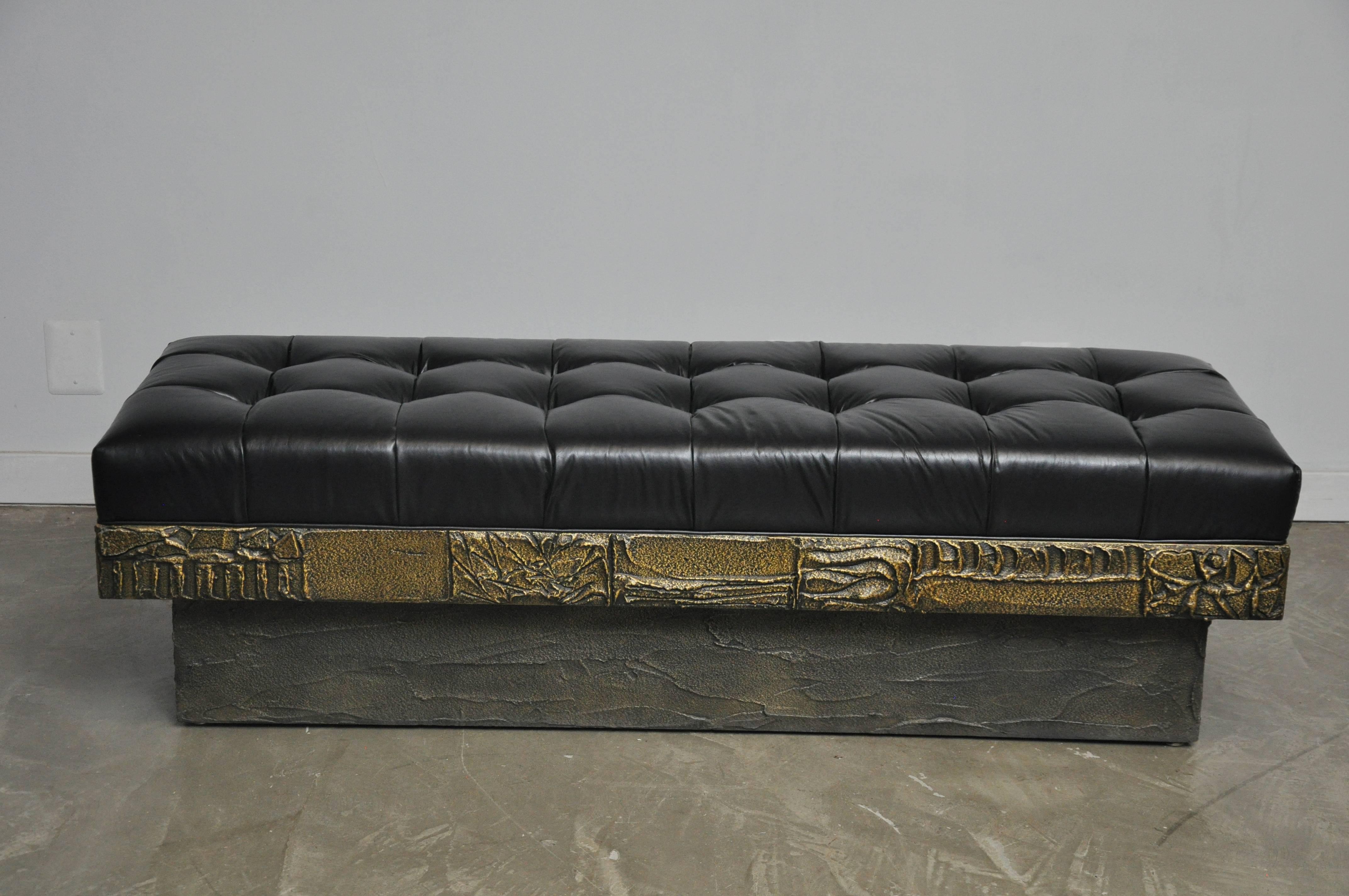 Rare sculpted bronze bench by Paul Evans for Directional. New tufted black leather cushion.