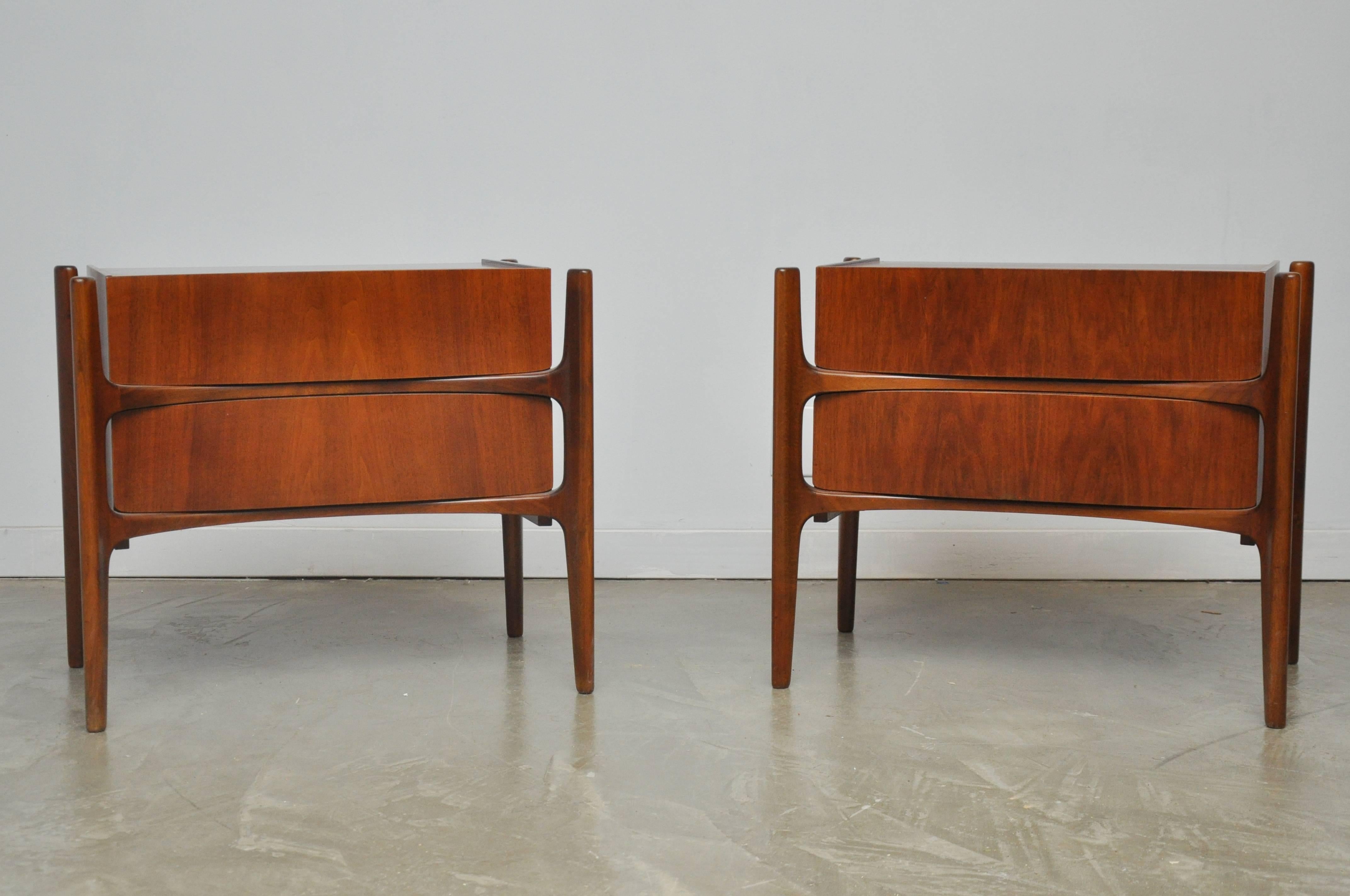 Pair of walnut nightstands by William Hinn. Fully restored and refinished.