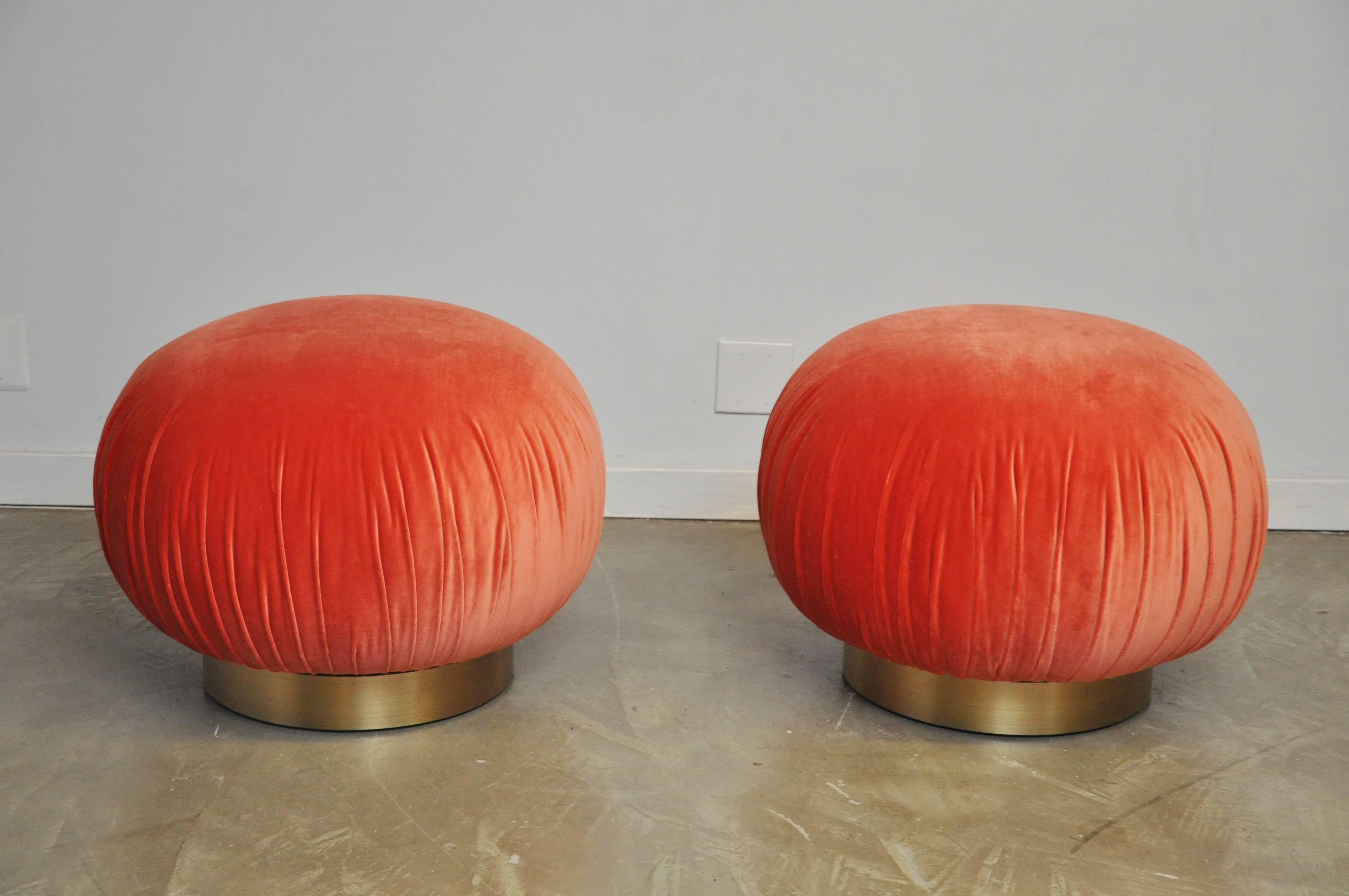 Pair of swivel stools by Adrian Pearsall for Comfort Design. Coral color velvet upholstery over brushed brass bases.