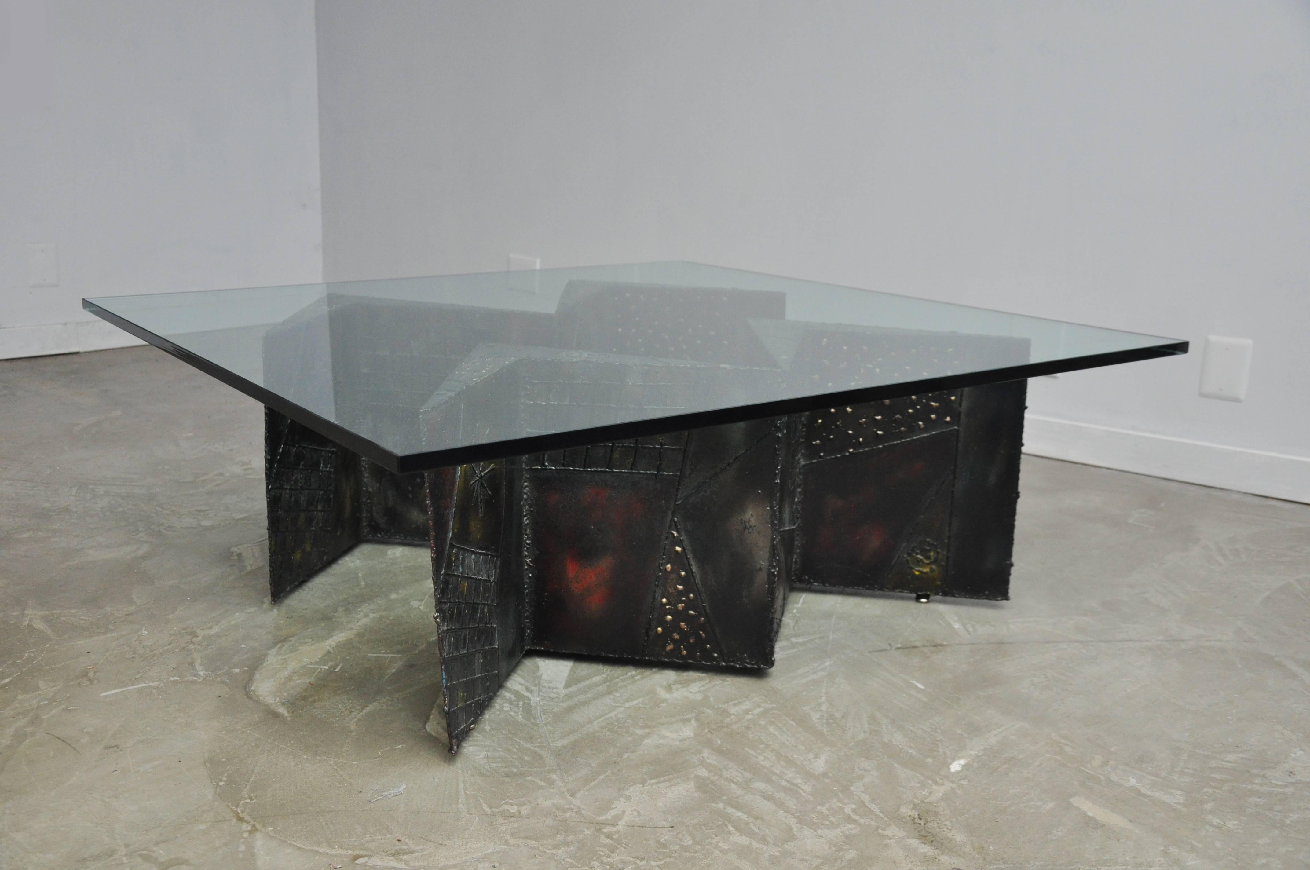 Large double zig zag pedestal coffee table by Paul Evans for Directional. Model PE-11. Sculpted and welded metal patchwork. Bronze patina accented by primary colors. New glass top.