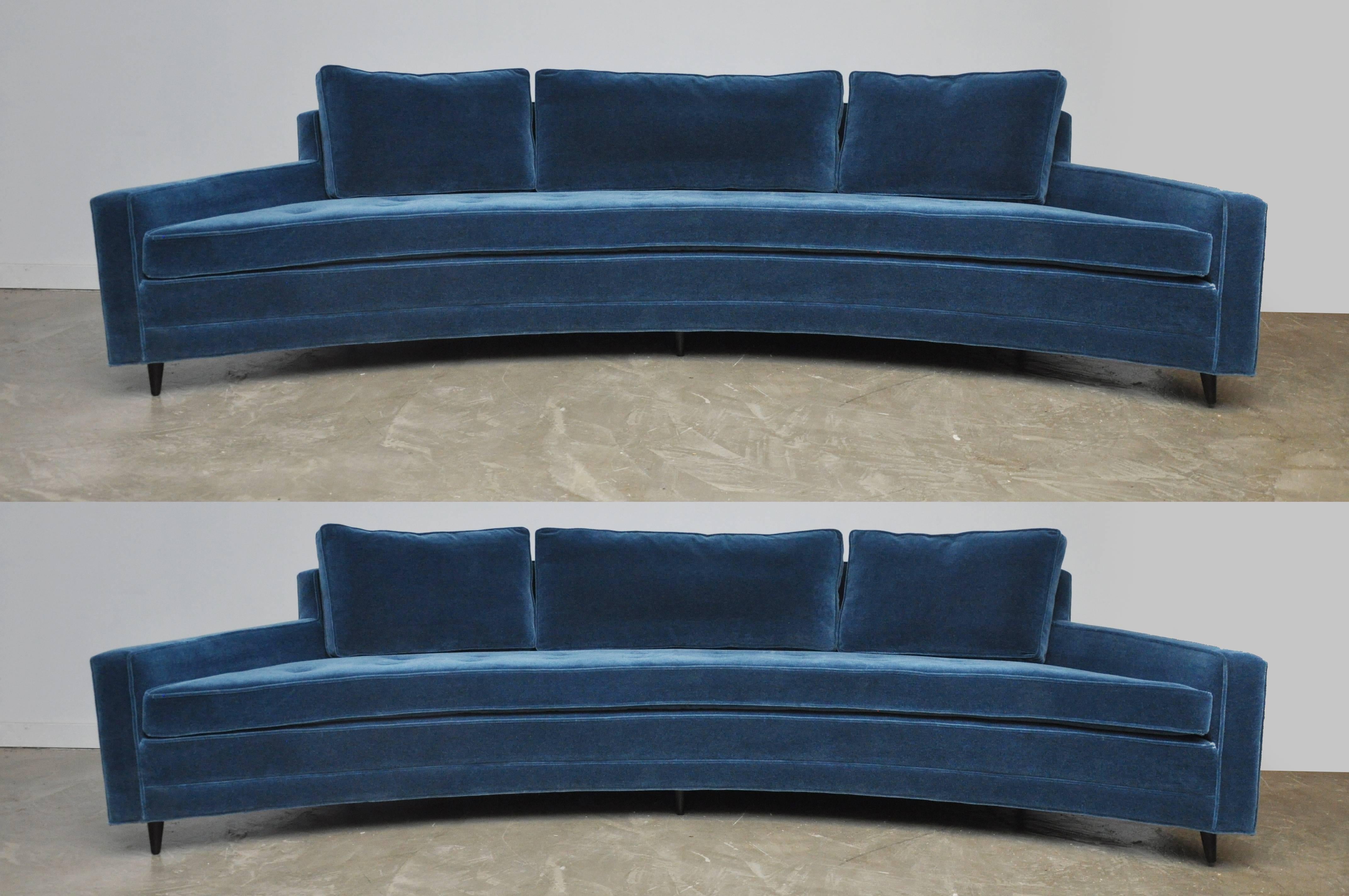 A pair of large curved sofas designed by Harvey Probber. Fully restored. Reupholstered in beautiful blue mohair over refinished espresso tone legs.