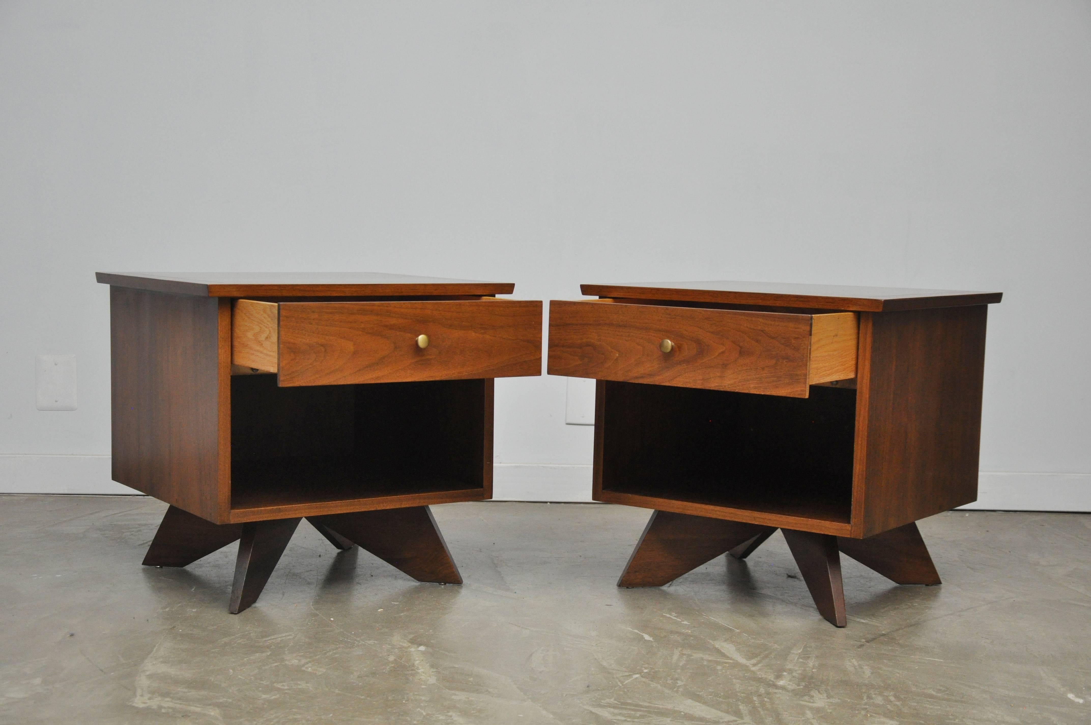 Pair of walnut nightstands or end tables by George Nakashima for Widdicomb, from his Sundra series. Tops have been refinished, all else is in perfect original condition.