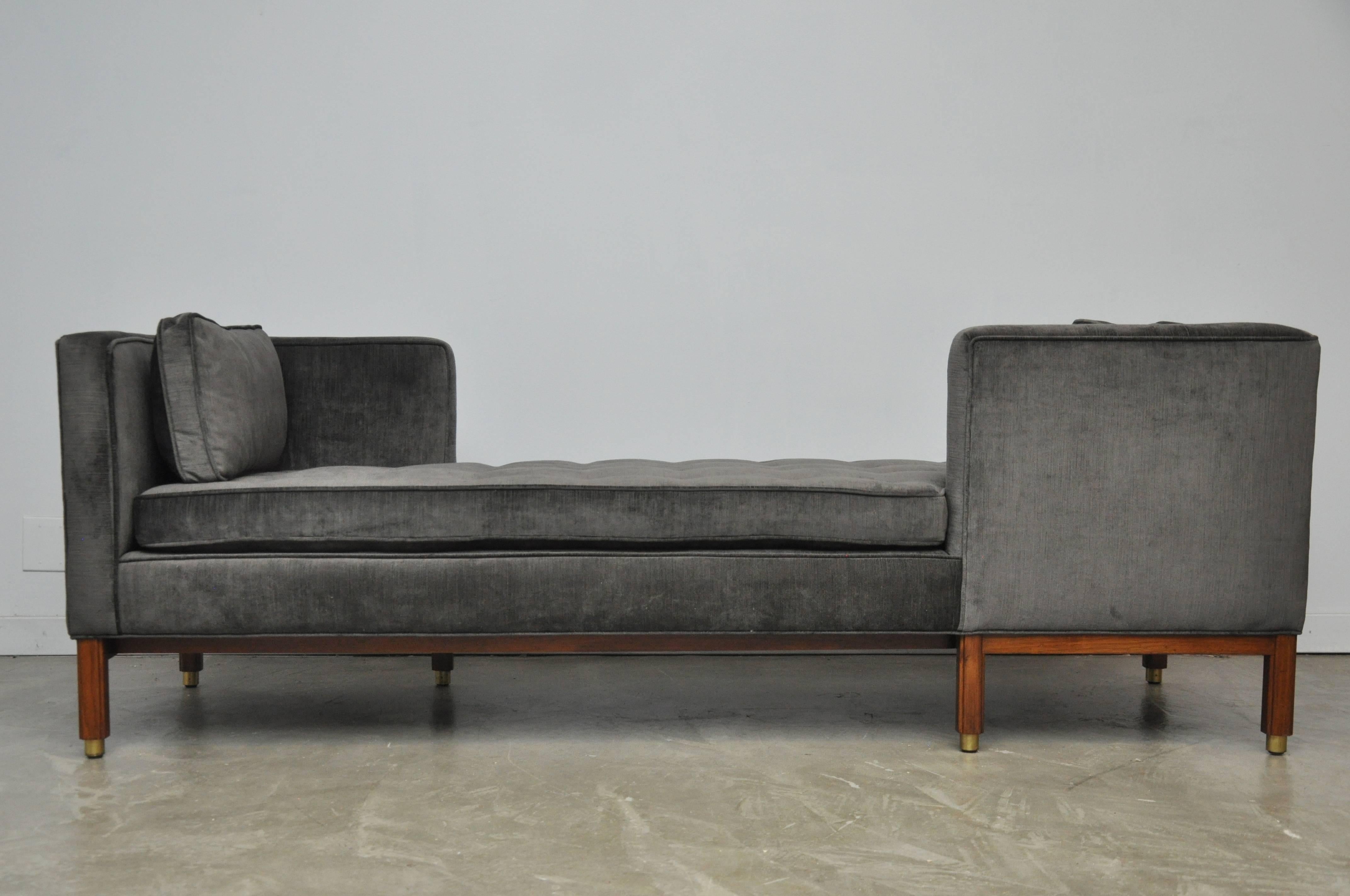 Dunbar Tete-a-tete sofa by Edward Wormley. Model 5944. Charcoal chenille velvet over refinished walnut tone bases with brass details.