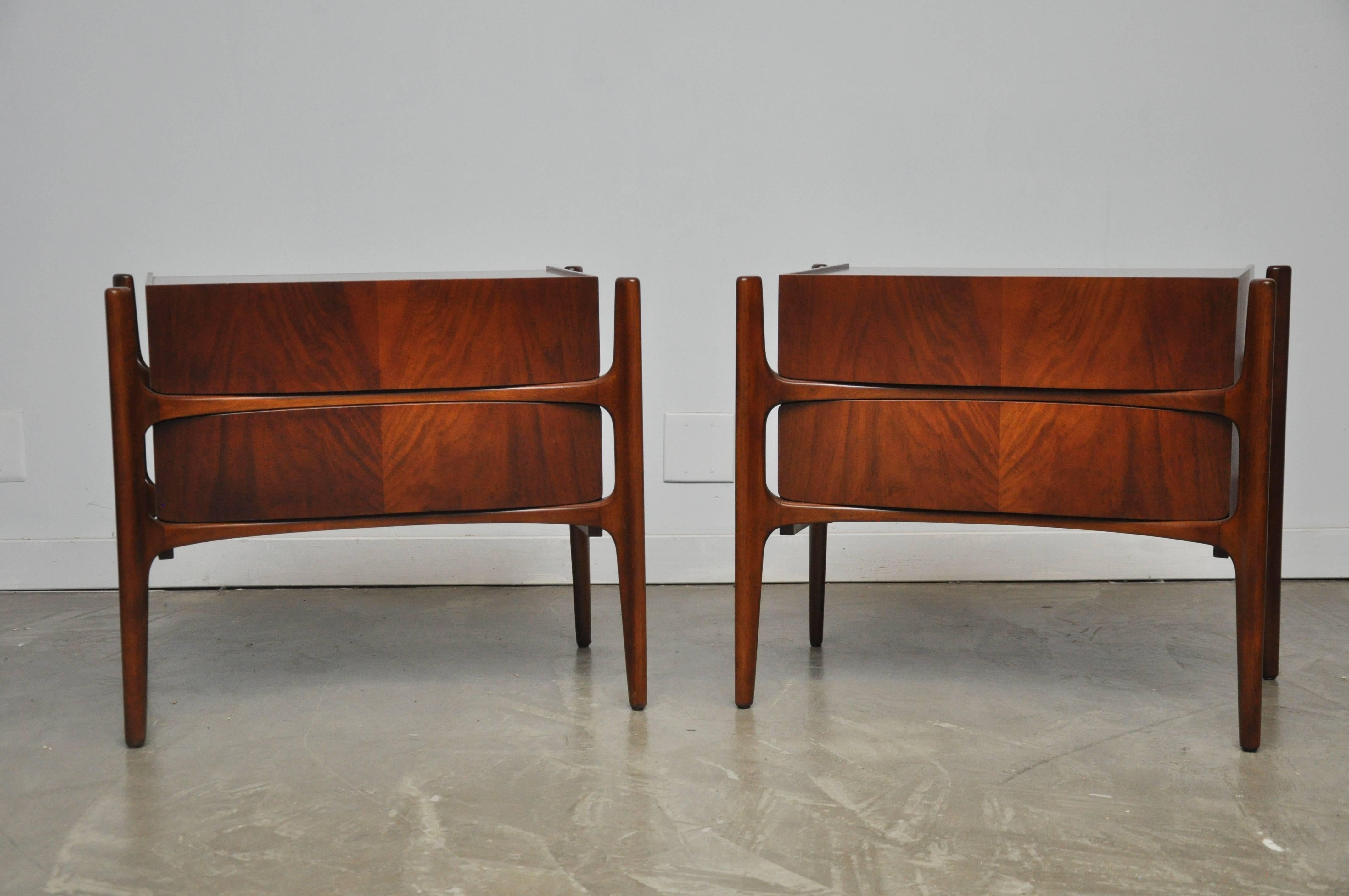 Pair of walnut nightstands by William Hinn. Fully restored and refinished.
 