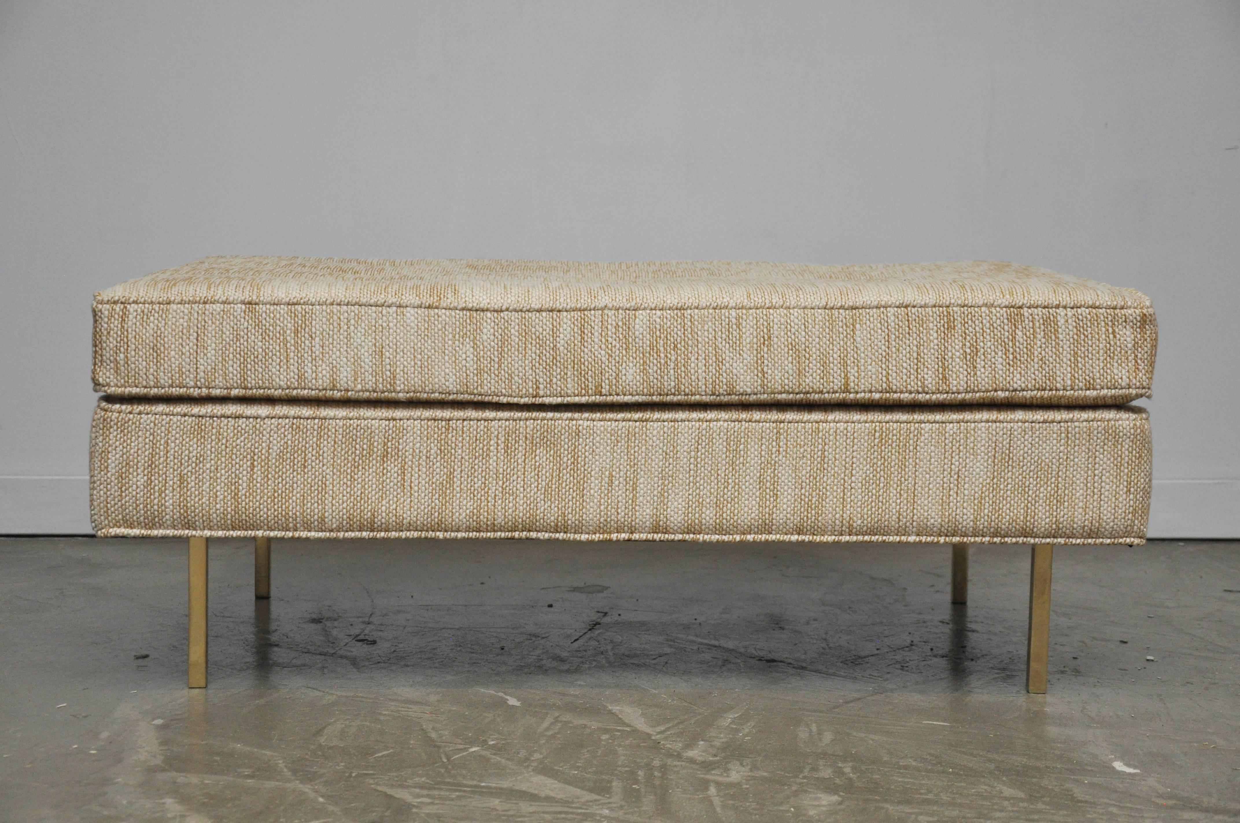 Large-scale bench ottoman by Harvey Probber. Fully restored. Beautiful new woven fabric sitting on brass legs.

 