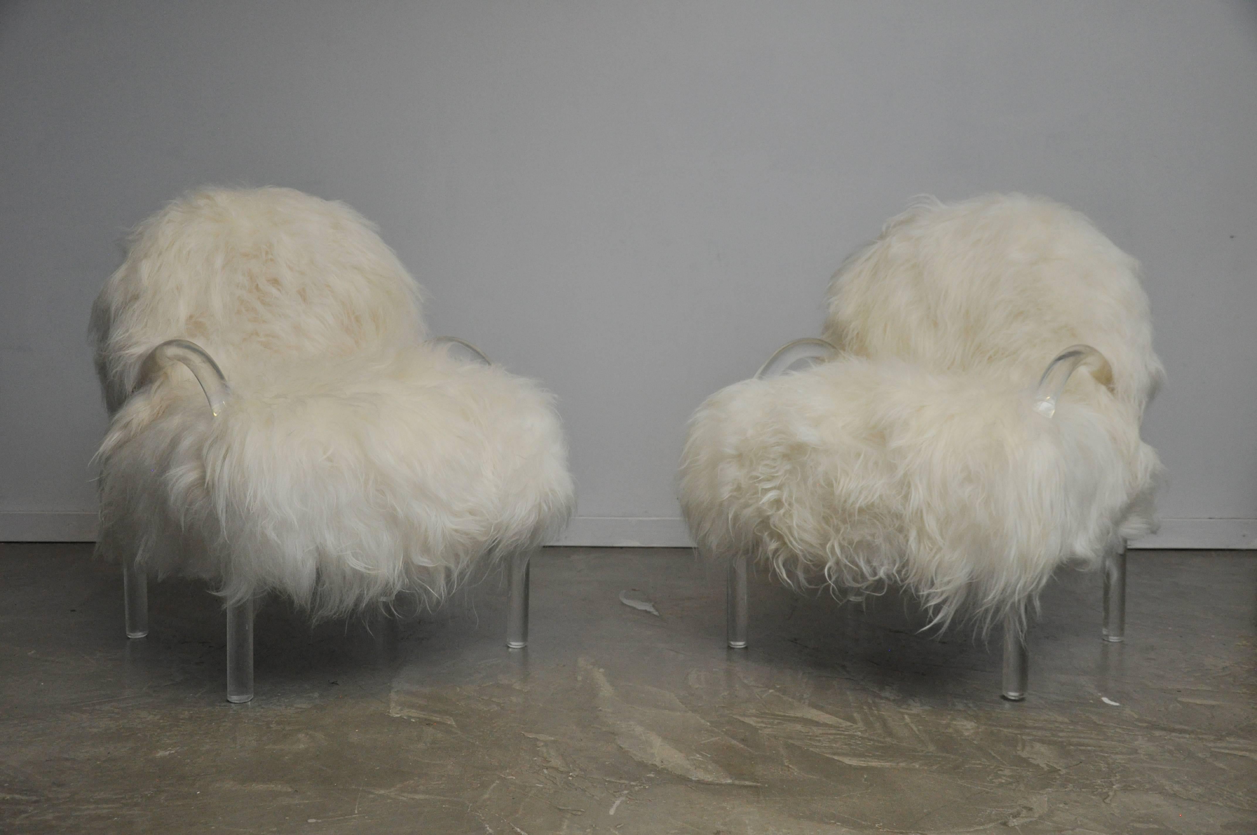 Lucite lounge chairs by Leon Pace for PACE Collection. Fully restored and reupholstered in Mongolian lamb.
