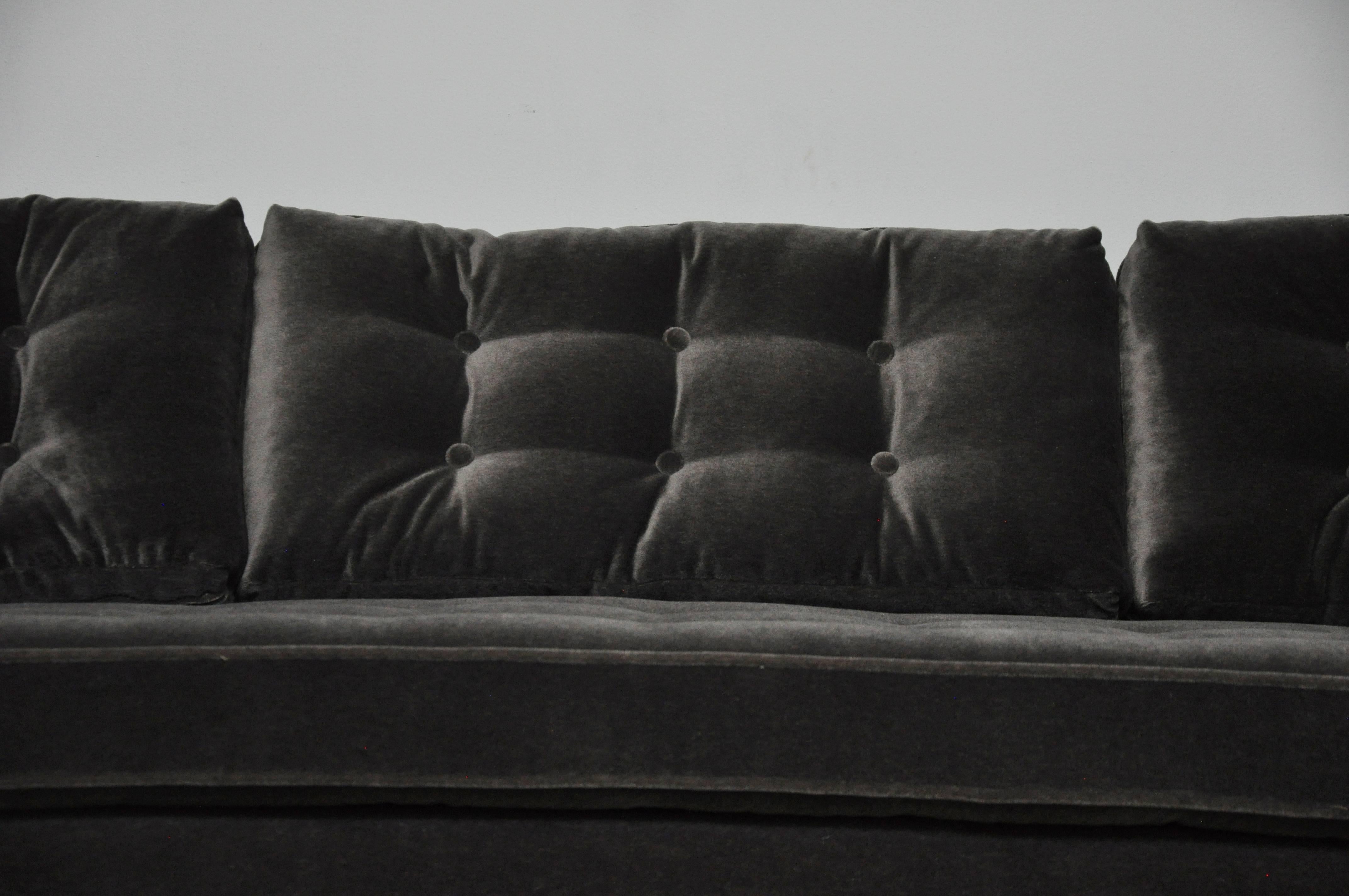 We are proud to offer this opulent curved sofa by Harvey Probber. Reupholstered in charcoal mohair.