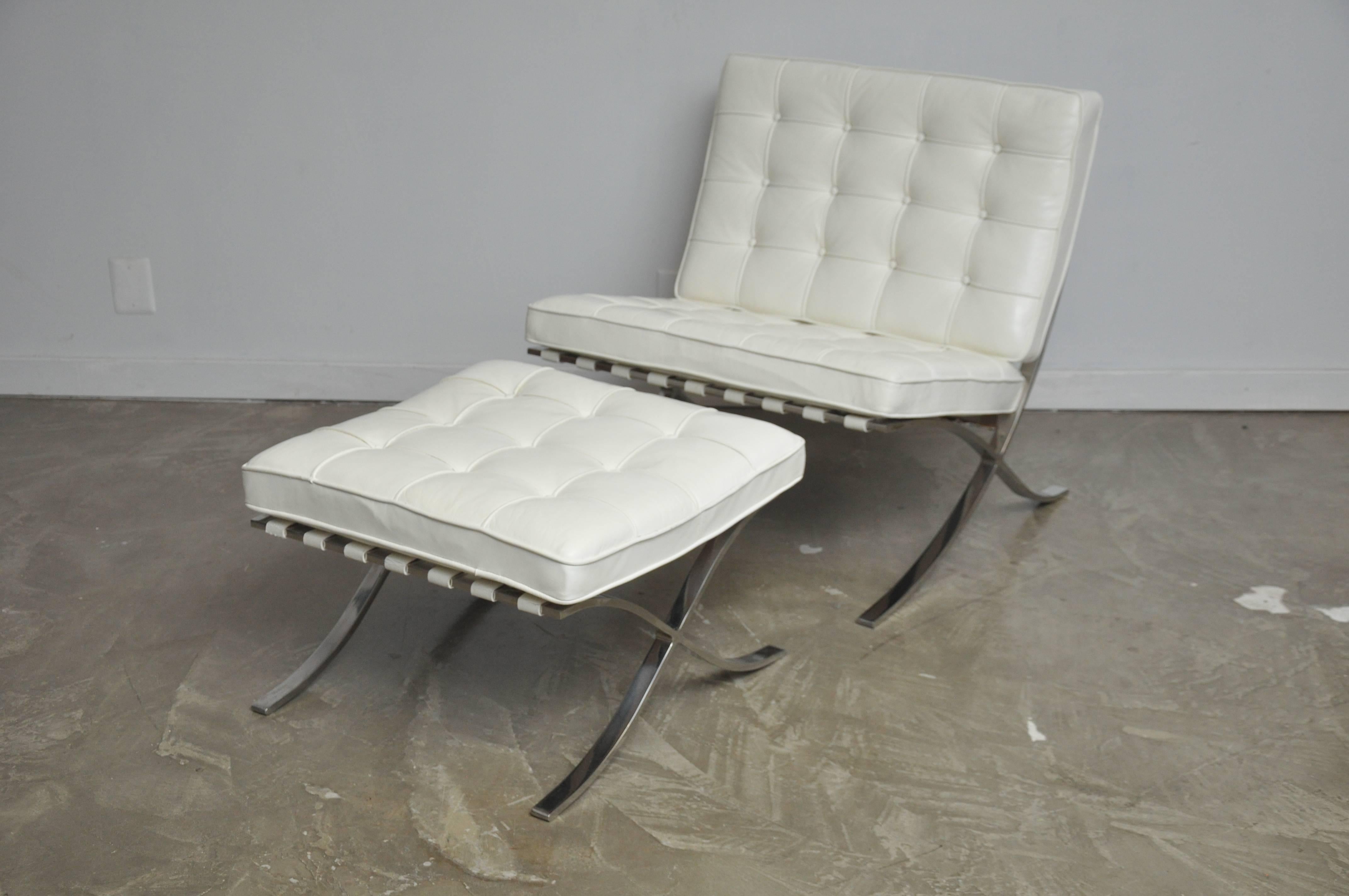 Barcelona chair and ottoman designed by Mies van der Rohe for Knoll, vintage chair, circa 1970s. Original white leather looks to have been re-died white again to maintain that it’s white tone. Set is marked Knoll.