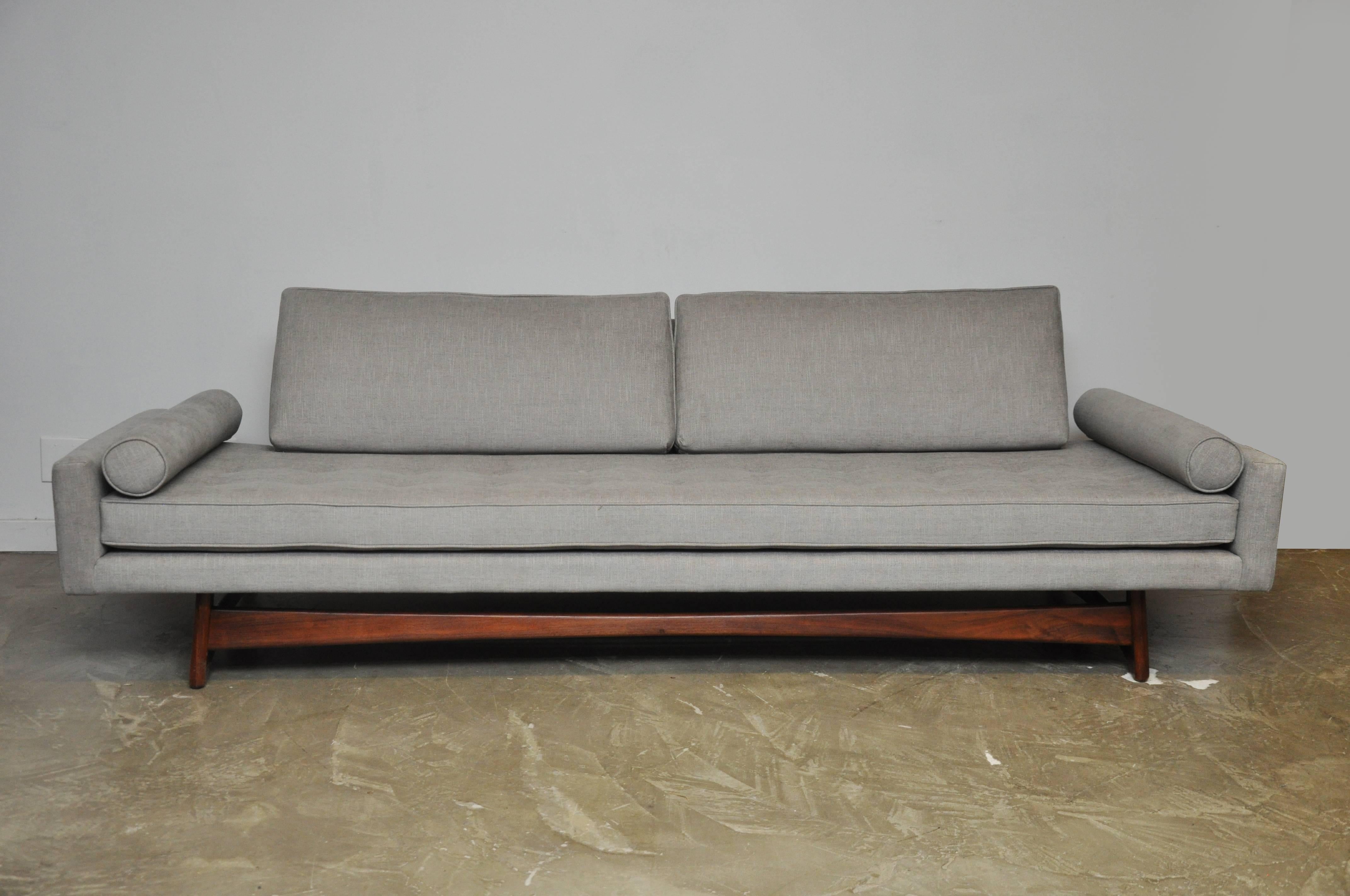 This fully restored Gondola sofa by Adrian Pearsall. Refinished sculptural walnut base with new upholstery.
