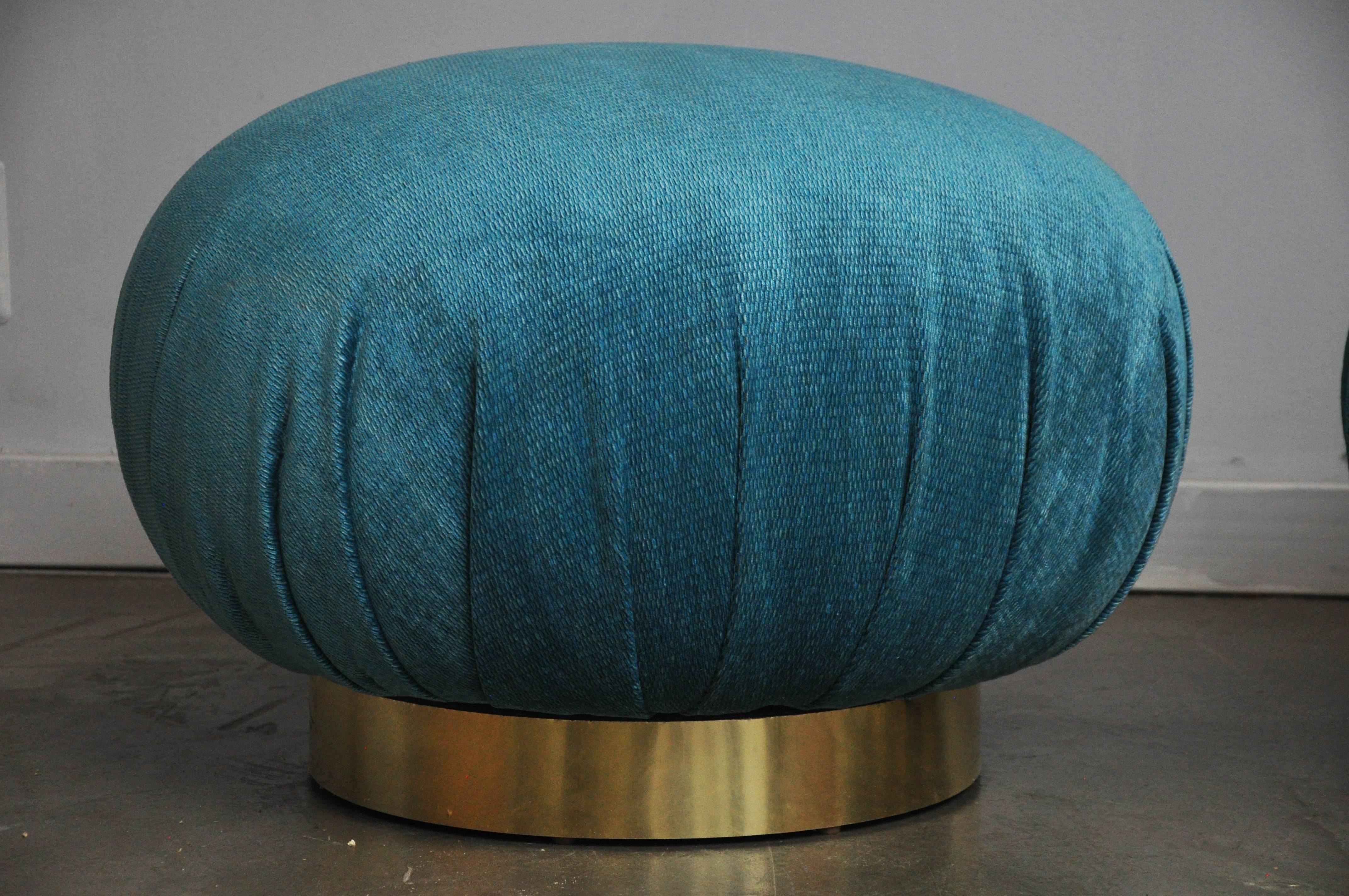 Pair of swivel pouf ottomans stools by Adrian Pearsall for Comfort Designs. Fully restored and reupholstered in turquoise chenille velvet over brass bases.