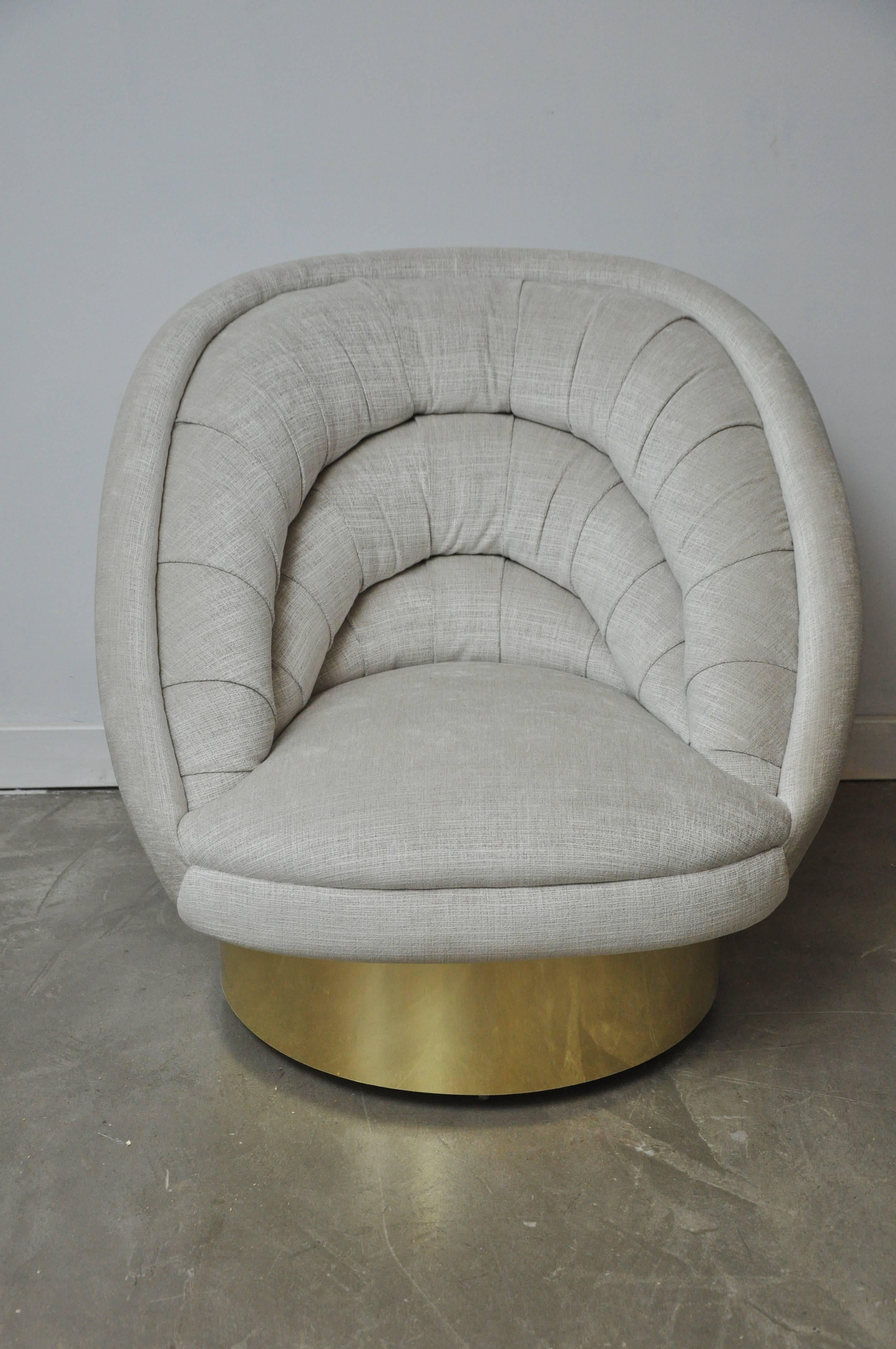 Vladimir Kagan crescent swivel chair on brass base. Fully restored and reupholstered.
 