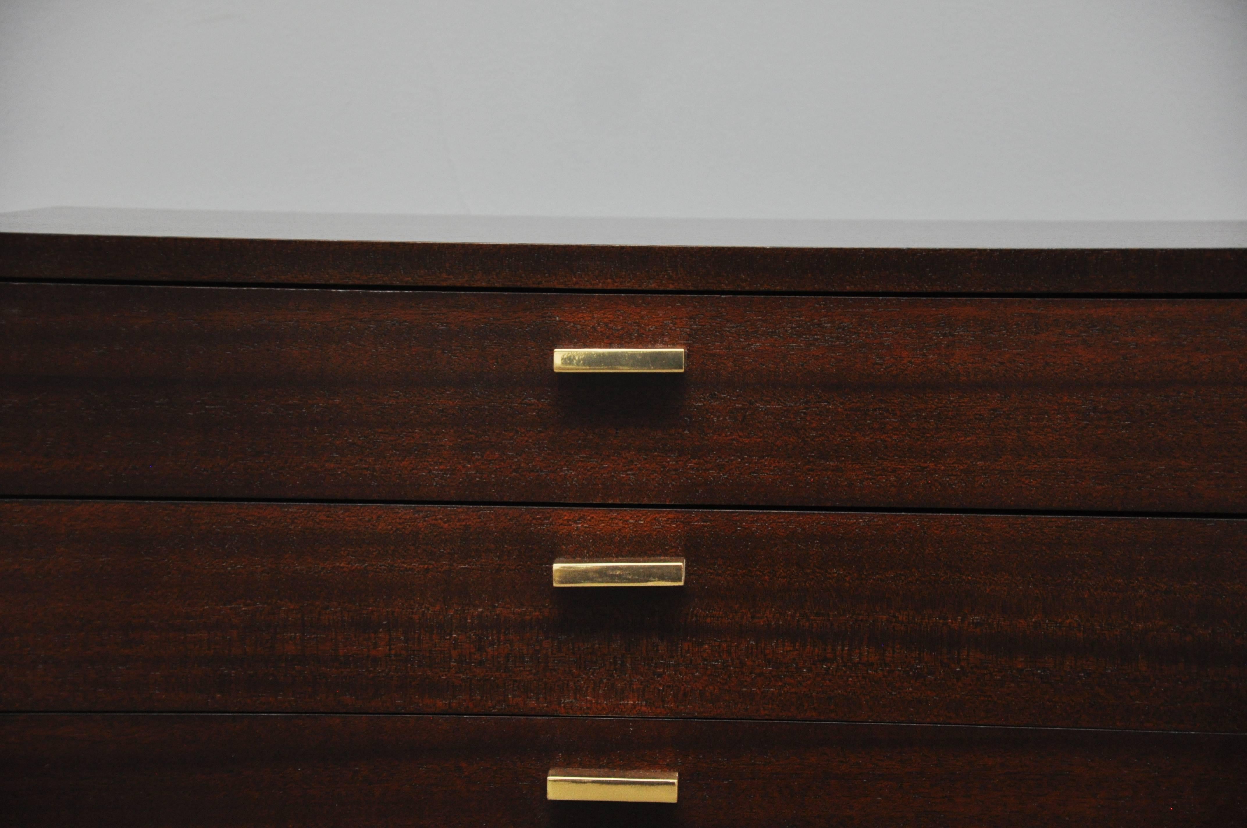 Harvey Probber three-drawer chest / nightstand /end table. A beautiful and versatile piece. Fully restored. Refinished mahogany case in espresso tone with polished brass.