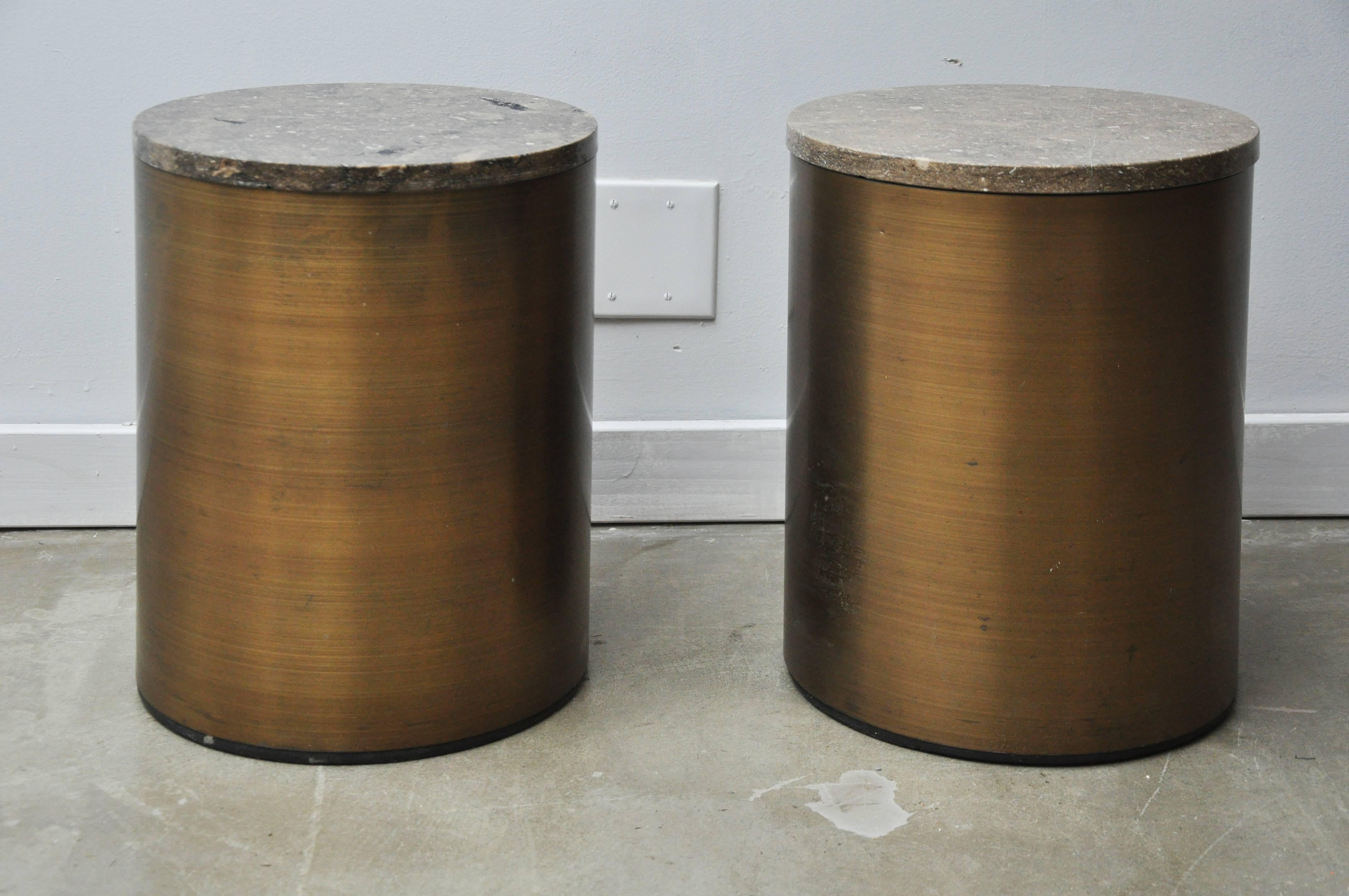 Bronze tone side tables by Paul Mayan. Each piece has a travertine top.