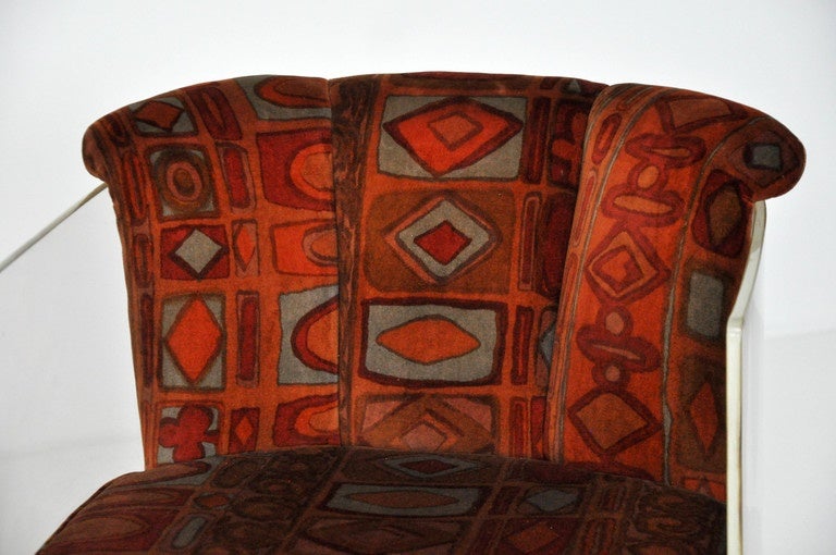 Lucite barrel lounge chairs designed by Vladimir Kagan.  Original Jack Lenor Larsen fabric.