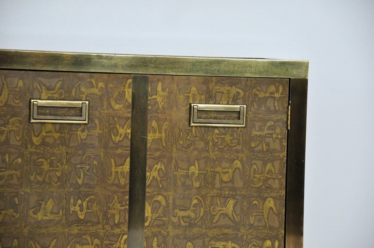 Brass clad server cabinet by Bernard Rohne for Mastercraft. Beautiful acid etched design to brass.