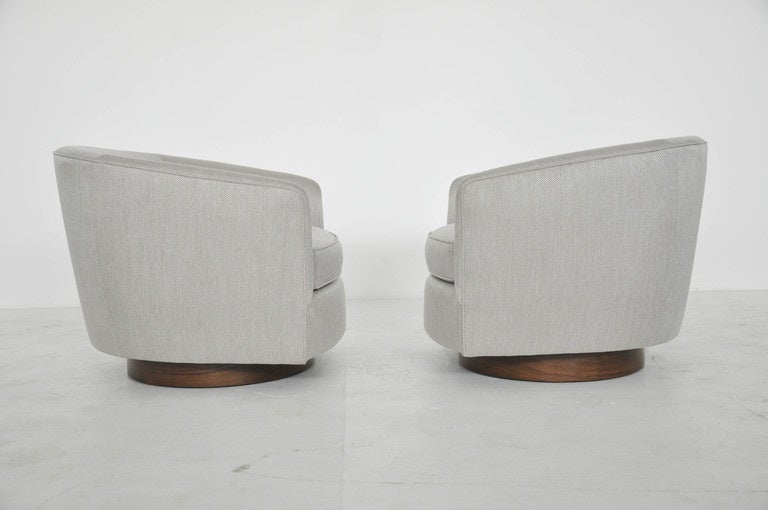 20th Century Milo Baughman Swivel Lounge Chairs on Walnut Bases