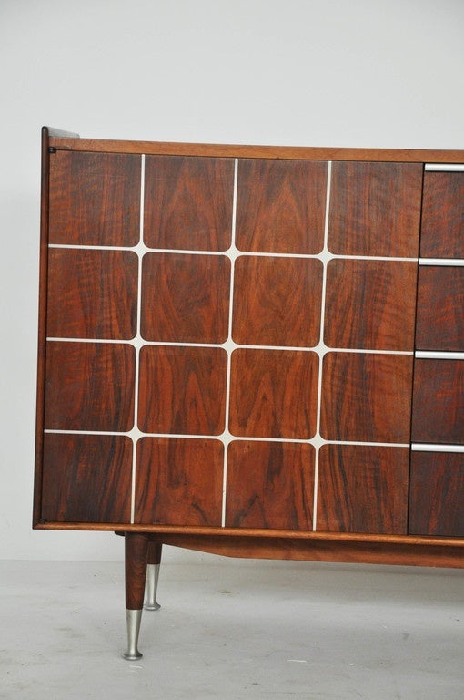 Rarely seen walnut sideboard by William Hinn. Aluminium handles and inlaid aluminium details. Marked 